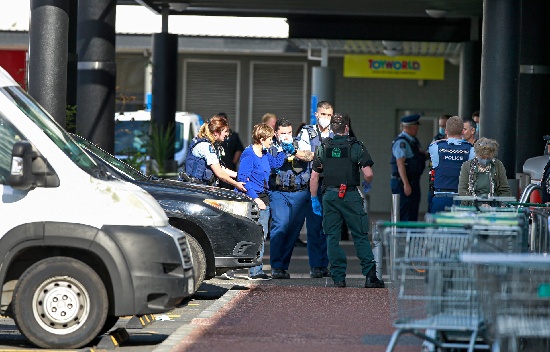 Police and the ambulance at the New Lynn Countdown after a terrorist attack in which six people were stabbed. Photo / Alex Burton