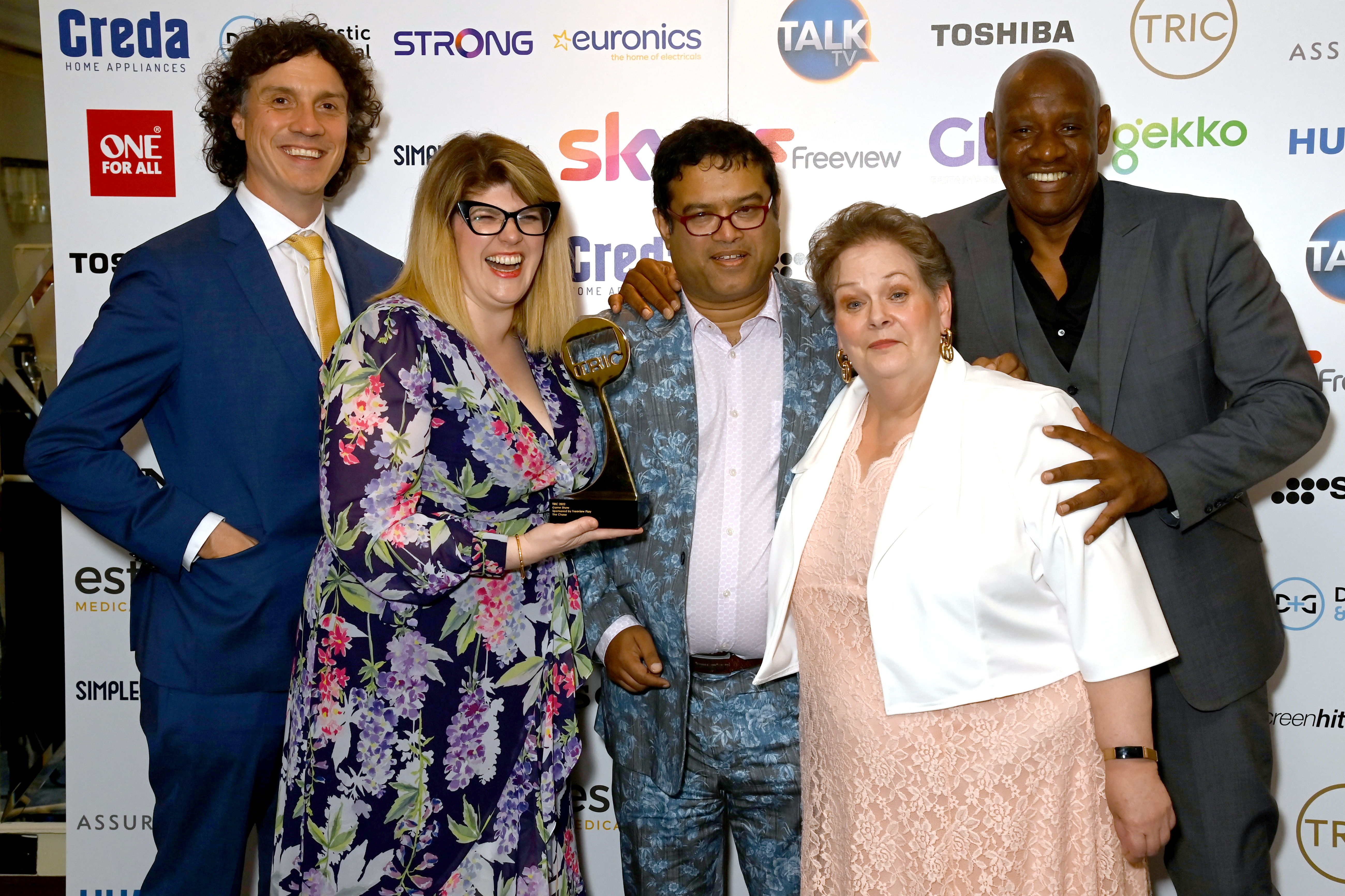 Shaun Wallace (far right) with his fellow Chasers Darragh Ennis, Jenny Ryan, Paul Sinha, and Anne Hegerty with the  Game Show award during the TRIC Awards. Photo / Getty Images
