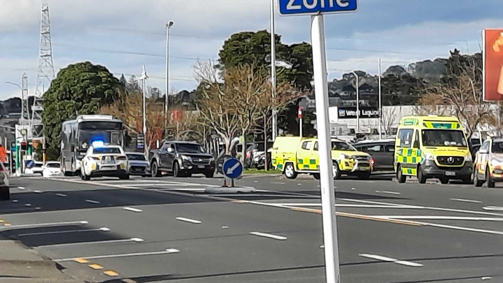 A bus can be seen parked in the middle of Great North Rd near the Lynn Mall entry. Photo / Hamish Fletcher