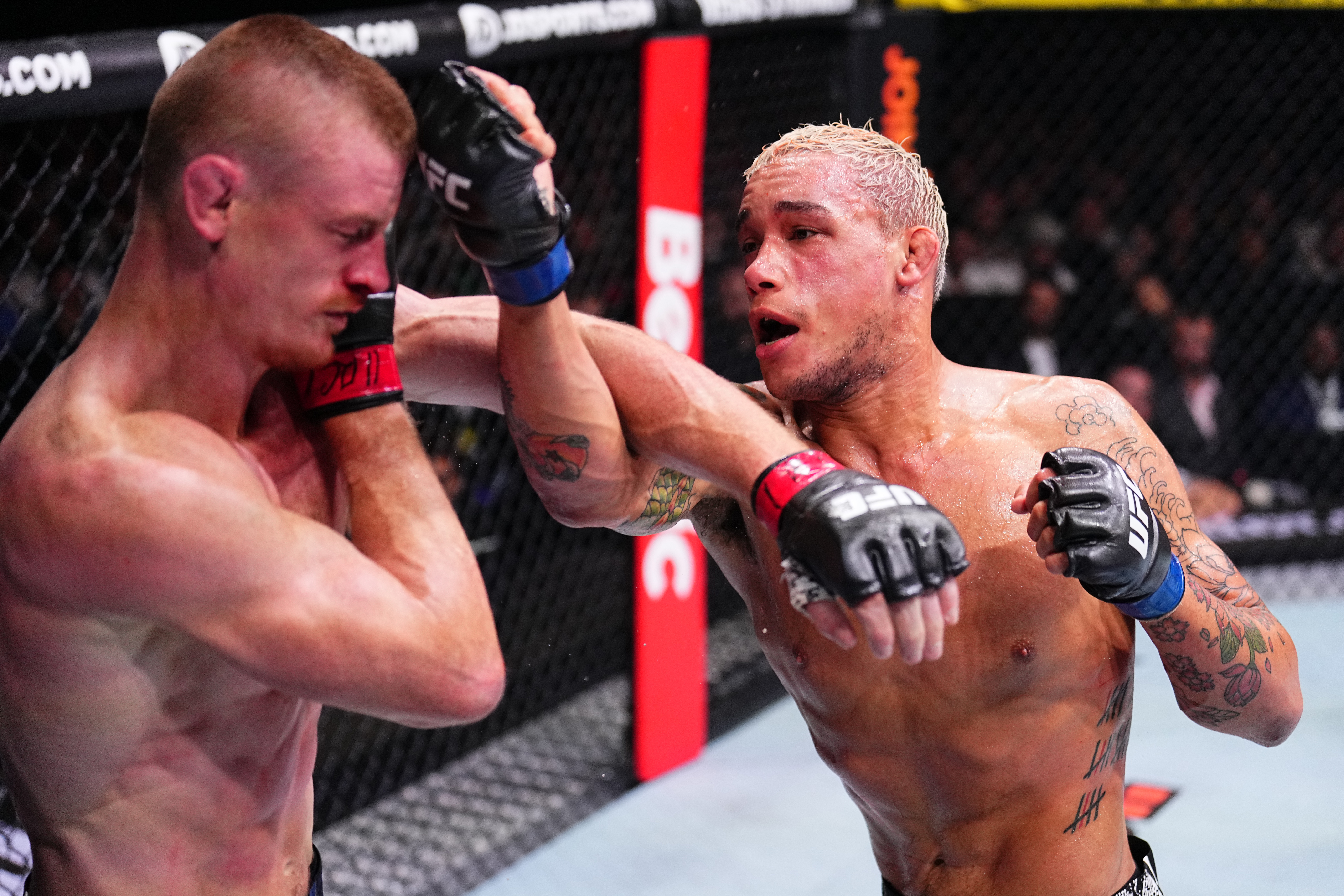 Bryan Battle punches Kevin Jousset. Photo / Getty Images