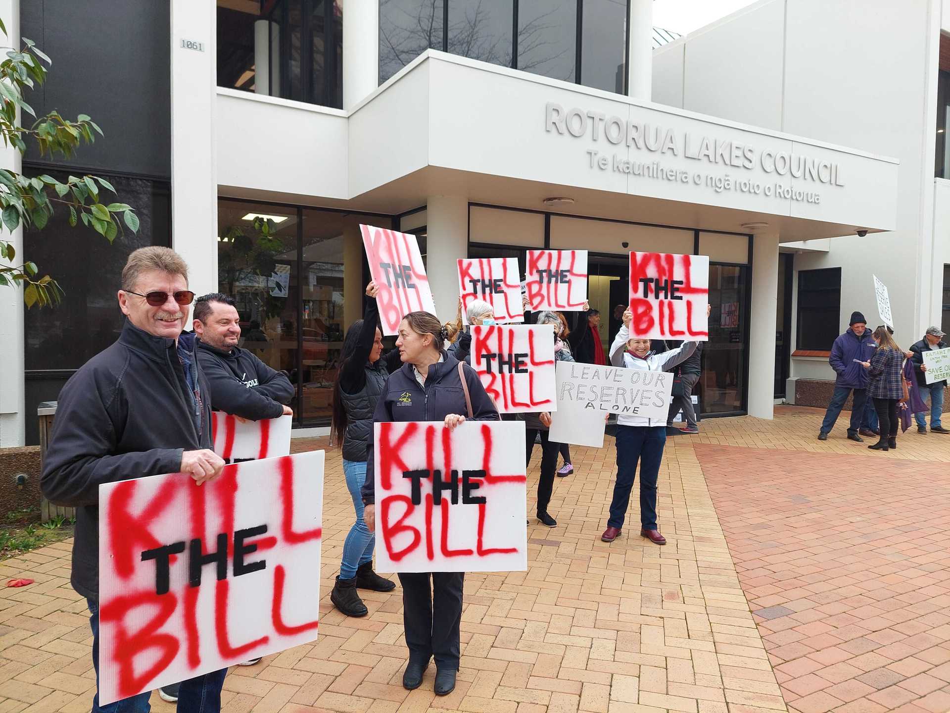 A group of protesters outside the Rotorua Lakes Council building. Photo / Ben Fraser