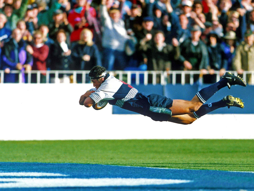 Charles Riechelmann dives over to score in the 1996 Super 12 final. Photosport