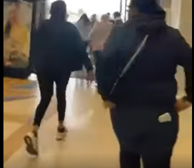 Footage on social media shows shoppers fleeing the mall.