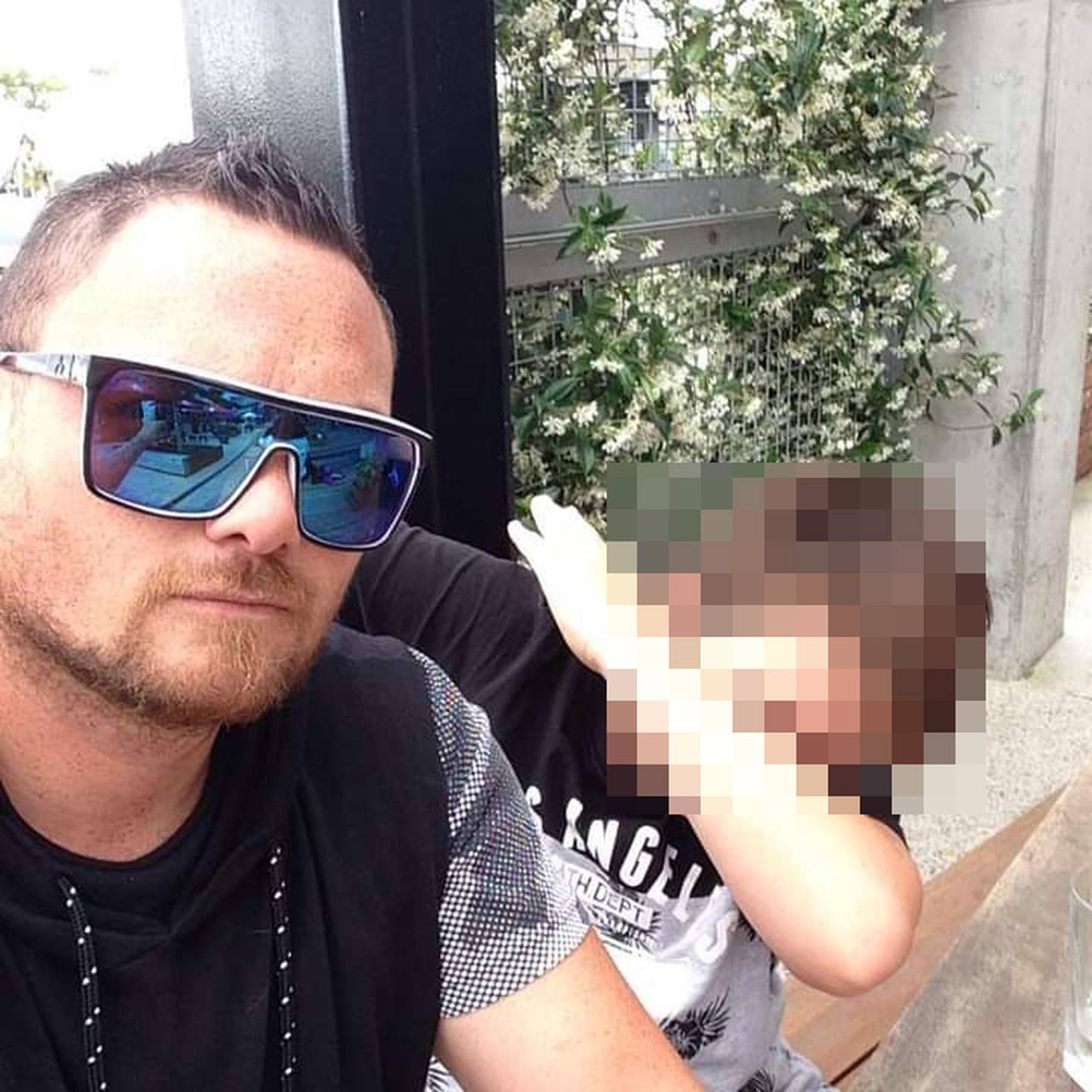 New Lynn homicide victim Robert James Hart, 40, was father to two sons. Photo / Supplied