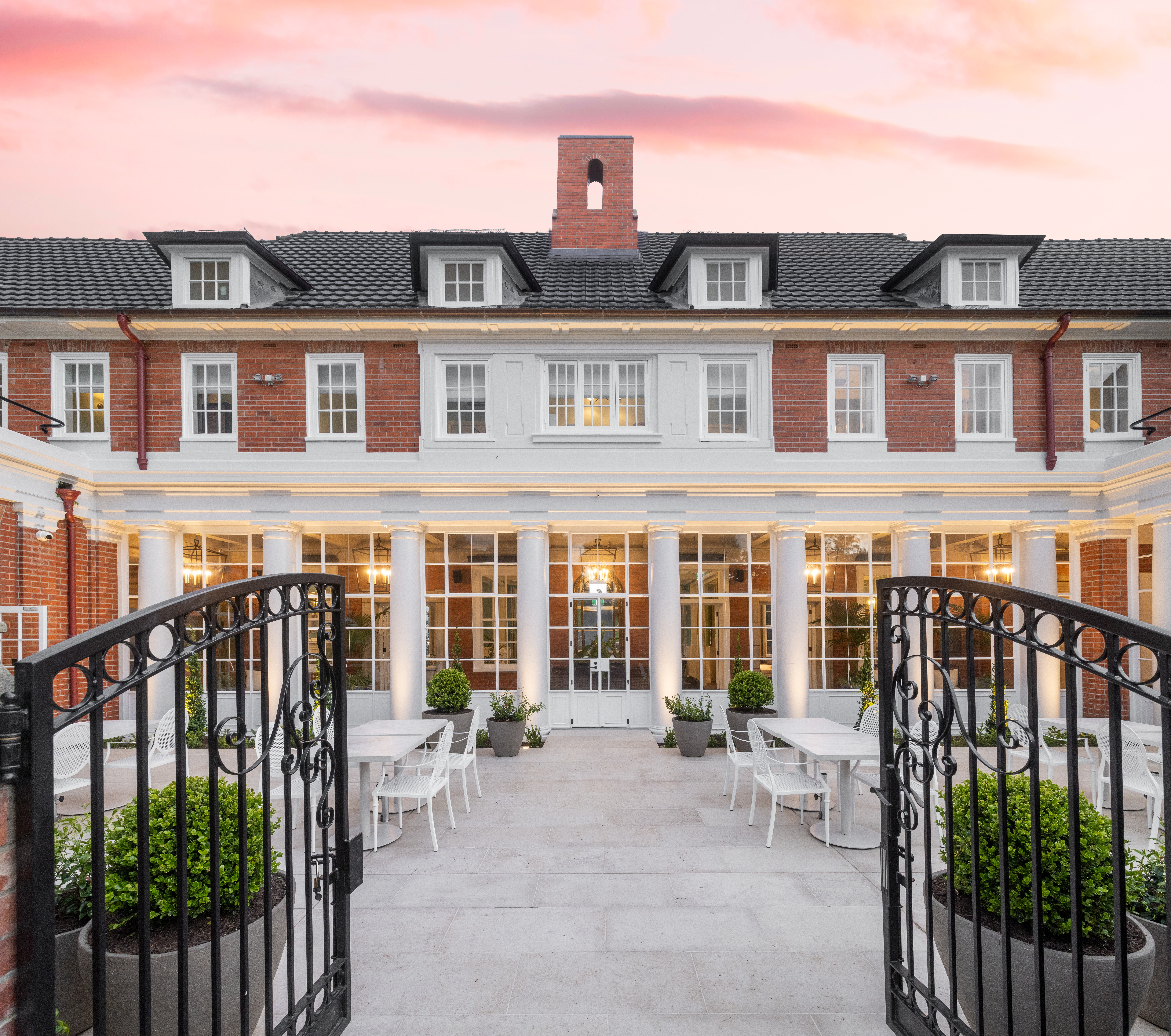 AFTER: Pearson House's restored courtyard, entranceway and frontage.  Photo / Generus Group