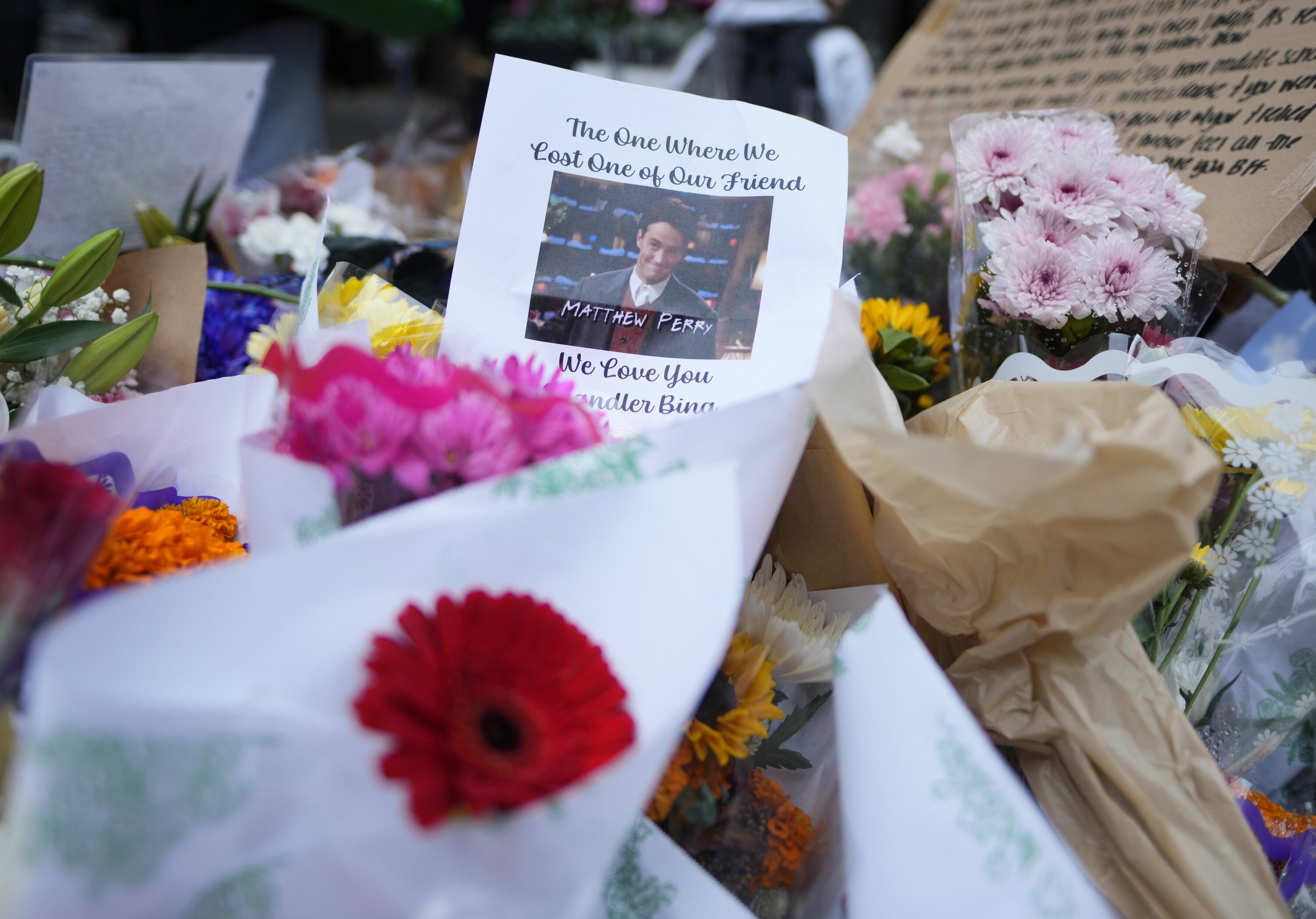 A makeshift memorial for Matthew Perry is seen outside the building shown in exterior shots of the television show Friends on October 30, 2023, in New York. Photo / Invision