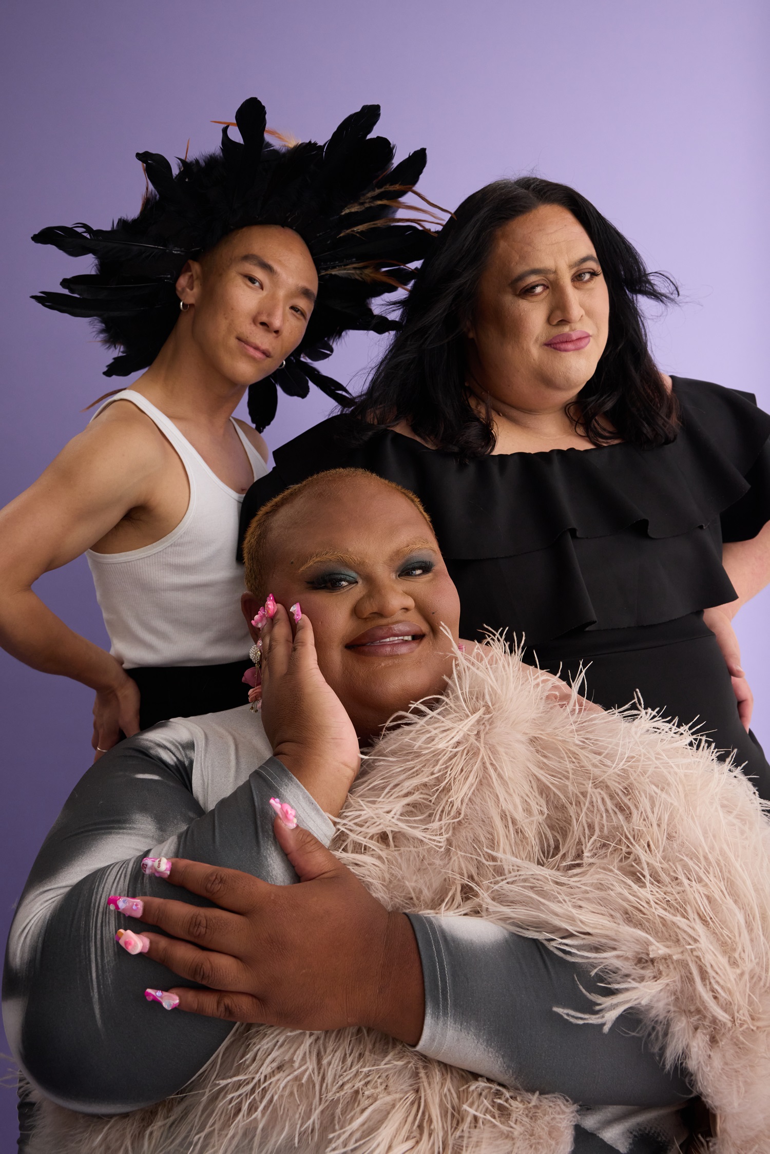 Xin Ji, Brady Peeti and Jonjon Tolovae take part in this year's Auckland Pride. Photo / Matt Hurley