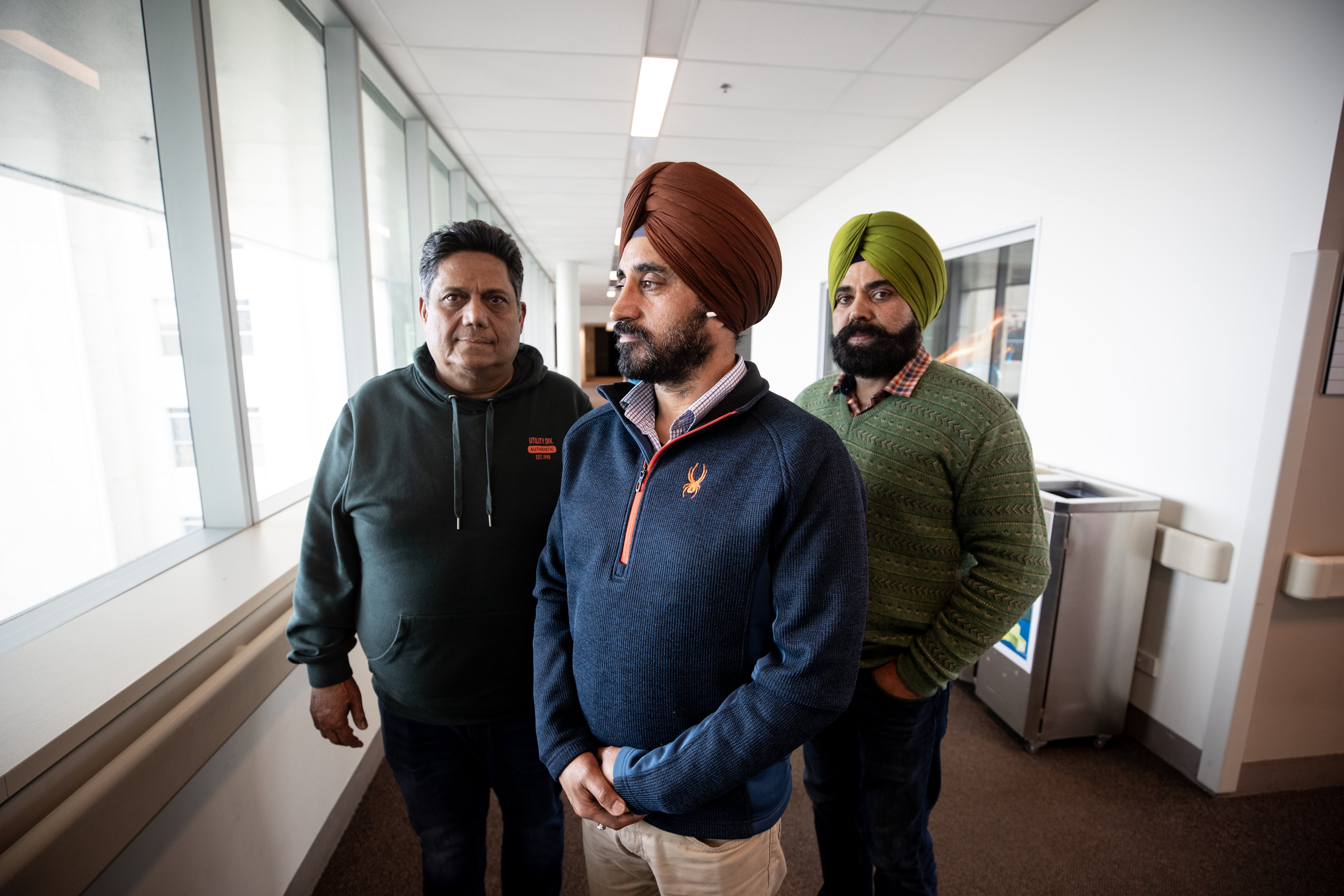 Business leaders Rajesh Goel president of the Auckland Indian Retailers Association (left), Jag Sidhu general secretary (centre) and community member Karan Sidhu (right). Photo / Dean Purcell