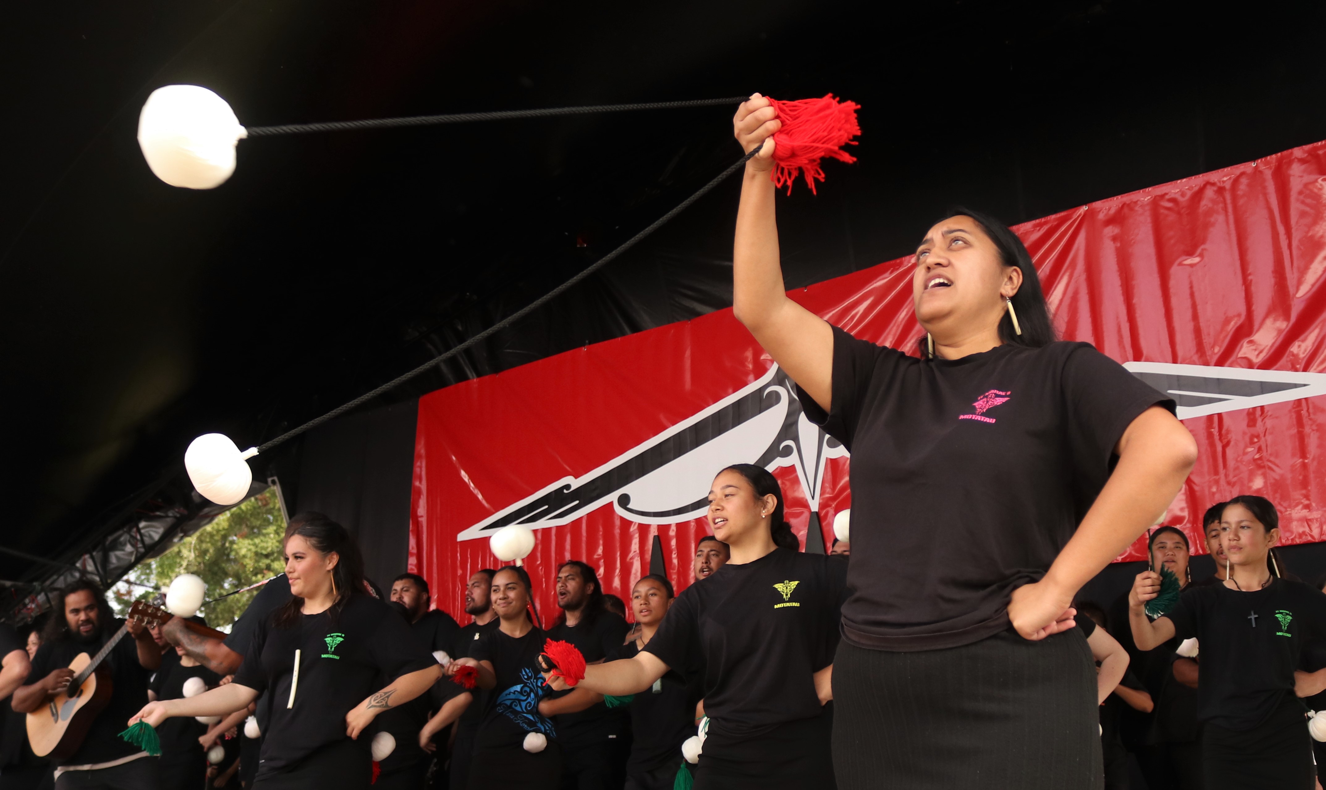 Kiri Paul, of Motatau Marae, demonstrates the long poi. Photo / Peter de Graaf