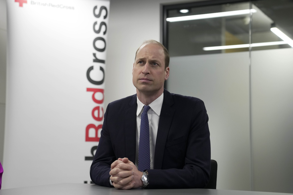 Britain's Prince William, the Prince of Wales, listens as he visits the British Red Cross at its headquarters in London, Tuesday, February 20. The Prince of Wales undertakes engagements which recognise the human suffering caused by the ongoing war in the Middle East and the subsequent conflict in Gaza, as well as the rise of antisemitism around the world. Photo / Kin Cheung, AP