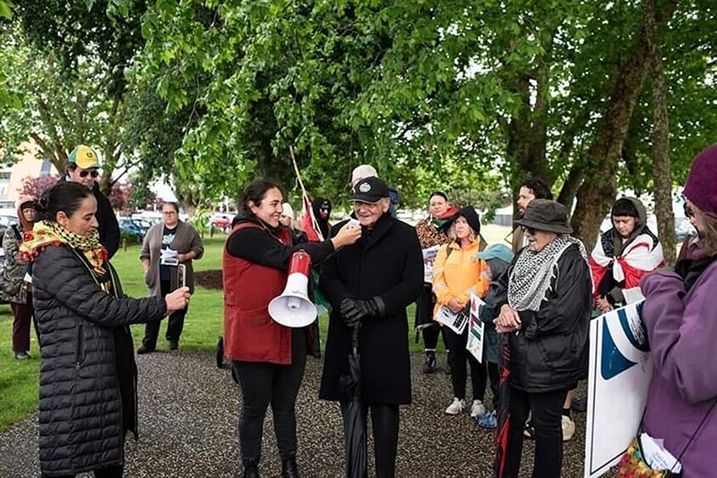 Koro Bom Gillies speaks at the Mataara Mai first march in November 2023.