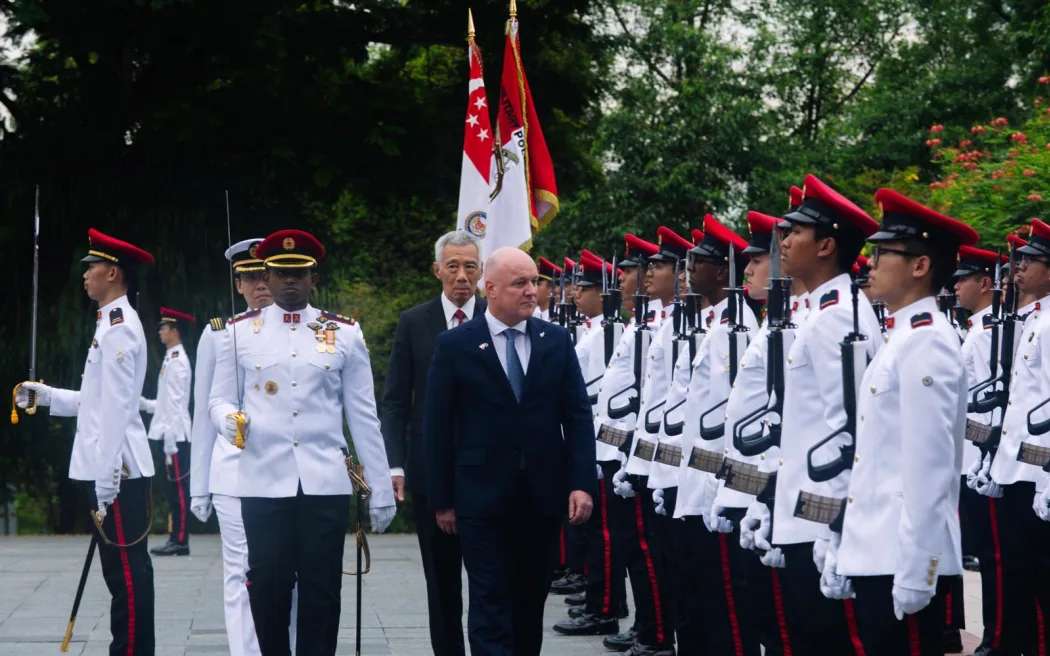 A guard of honour welcomes Luxon to the Istana, Singapore. Photo / Craig McCulloch, RNZ