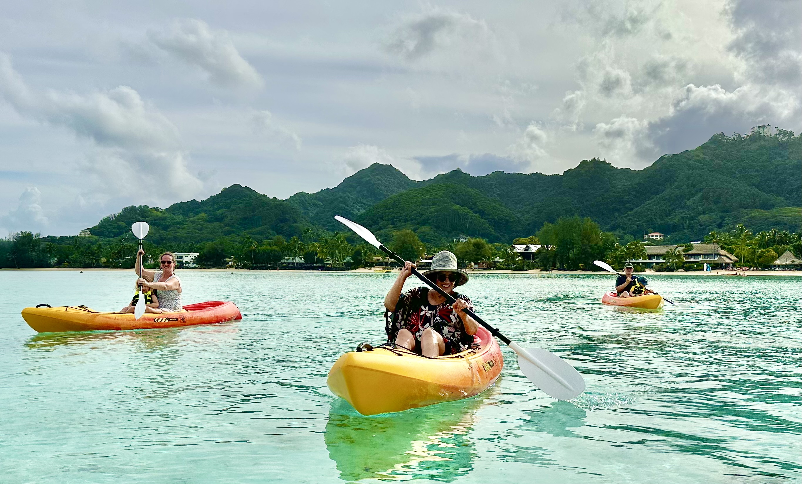Aimee, Riley, Kathy, Tiria and Harry Goudie paddling Muri Lagoon. Photo / Tim Roxborogh
