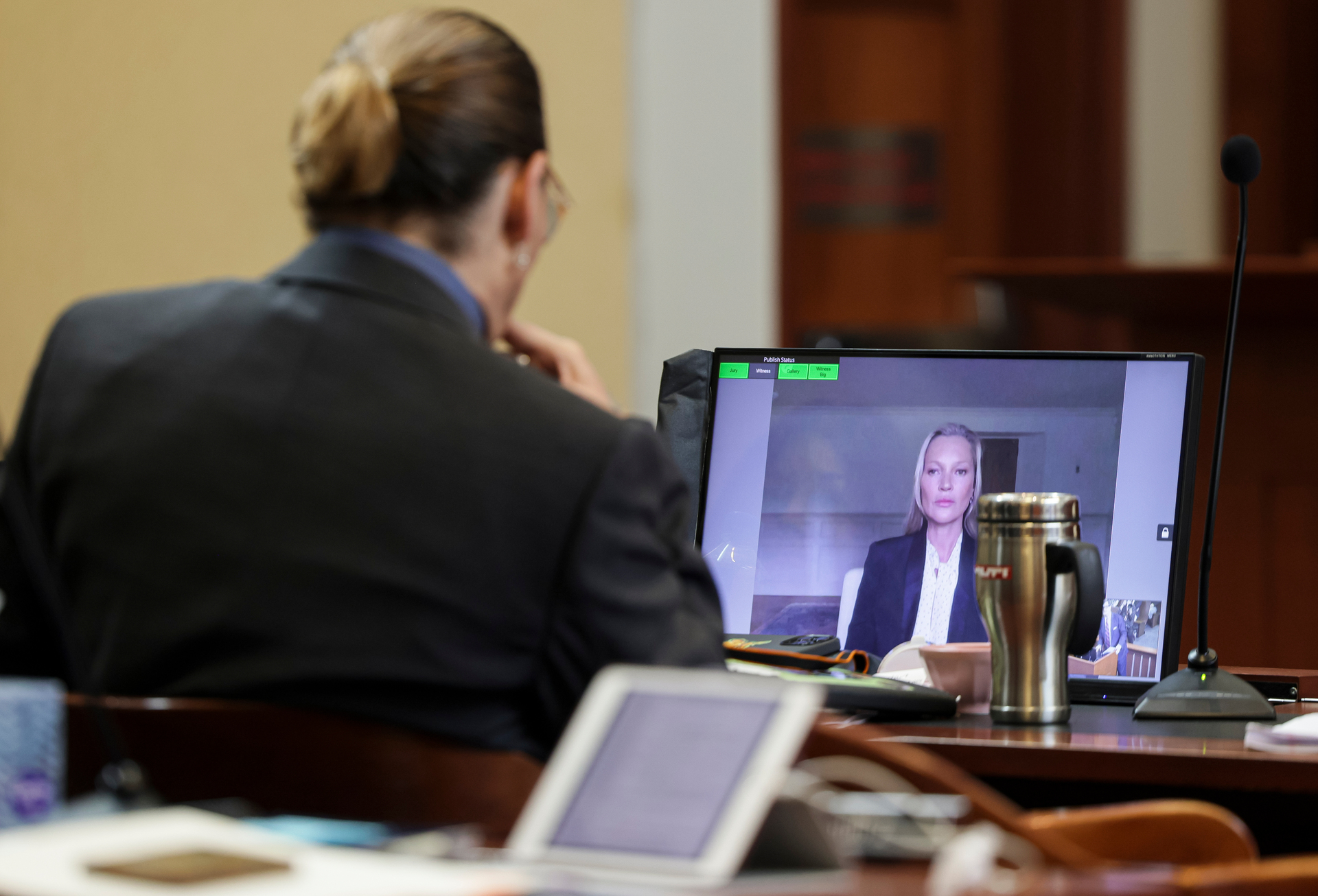 Johnny Depp watches on as former girlfriend Kate Moss testifies via video link. Photo / Evelyn Hockstein, Pool via AP