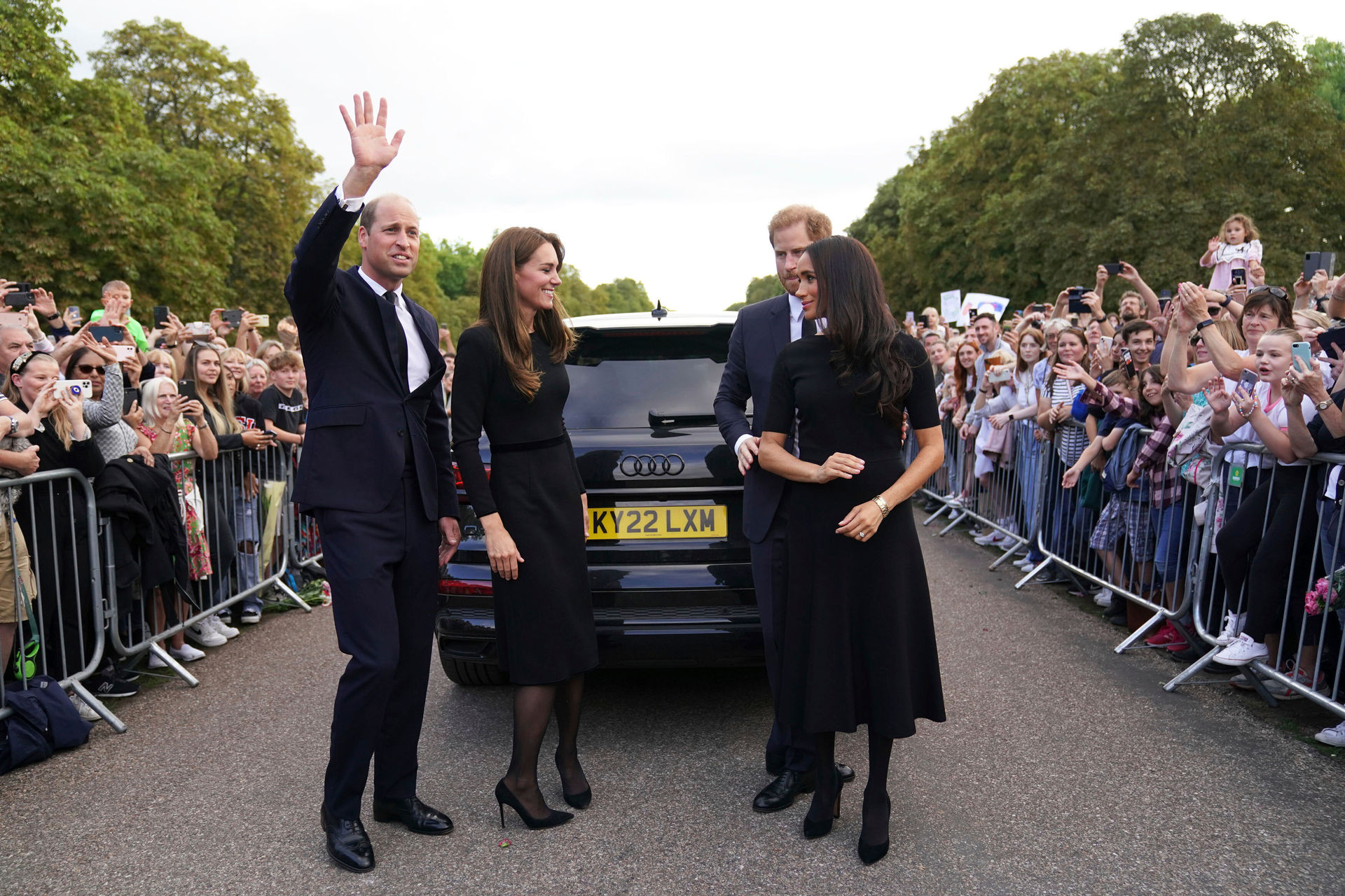 Prince William, Prince of Wales, Kate, Princess of Wales, Prince Harry and Meghan, Duchess of Sussex meet members of the public at Windsor Castle. Photo / AP