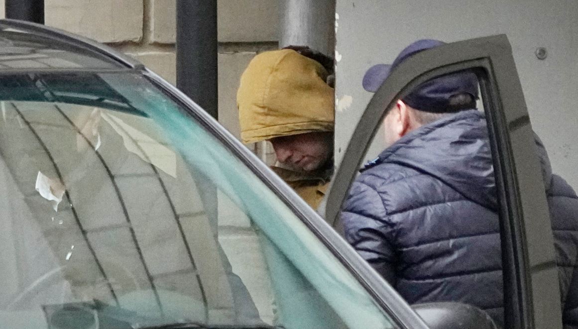 Wall Street Journal reporter Evan Gershkovich is escorted by officers from the Lefortovsky court to a bus in Moscow, Russia. Photo / AP