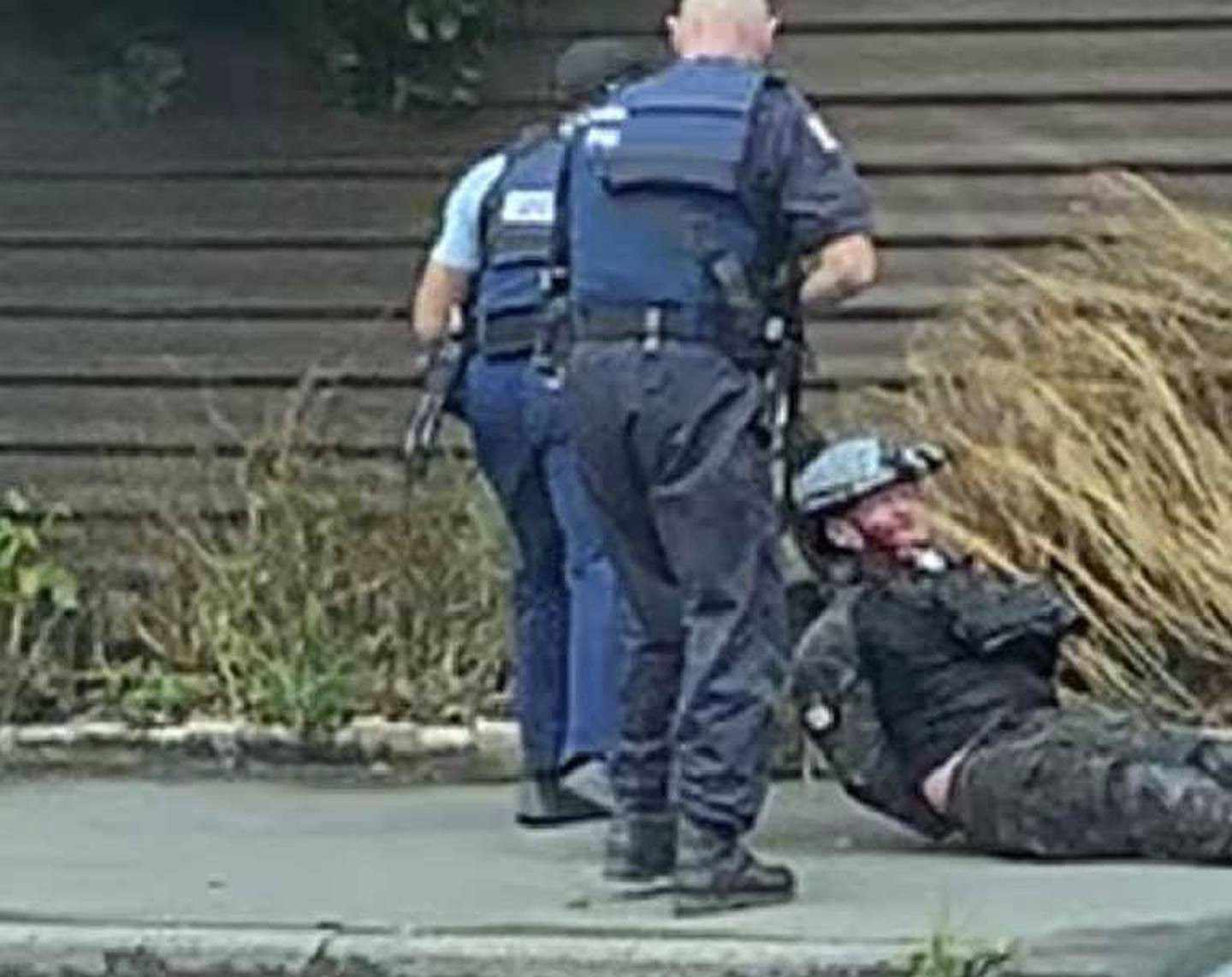 Police arresting the gunman after an attack on two mosques in Christchurch 15 March 2019.