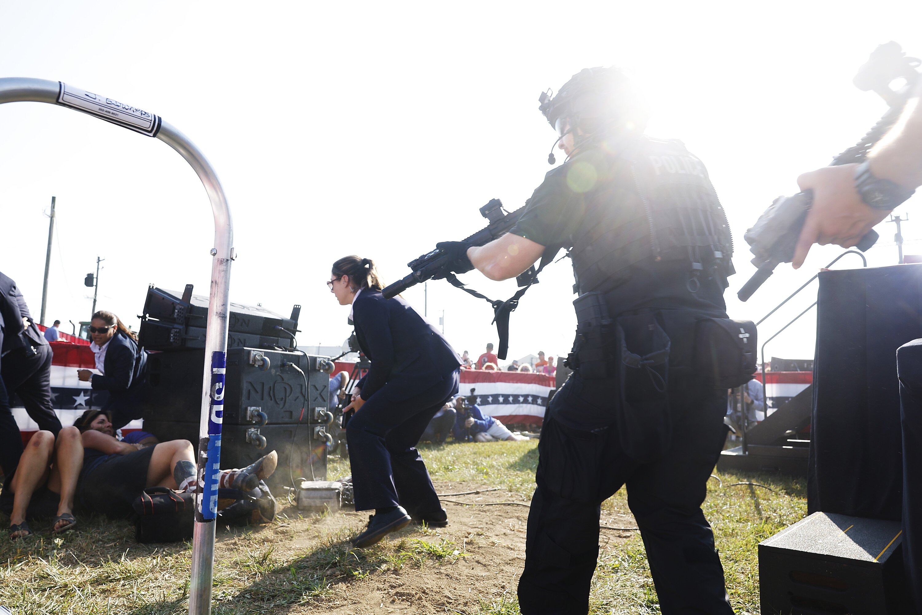 Law enforcement react after shots were fired at Republican presidential candidate former President Donald Trump's rally in Butler, Pennsylvania. Photo / Getty Images