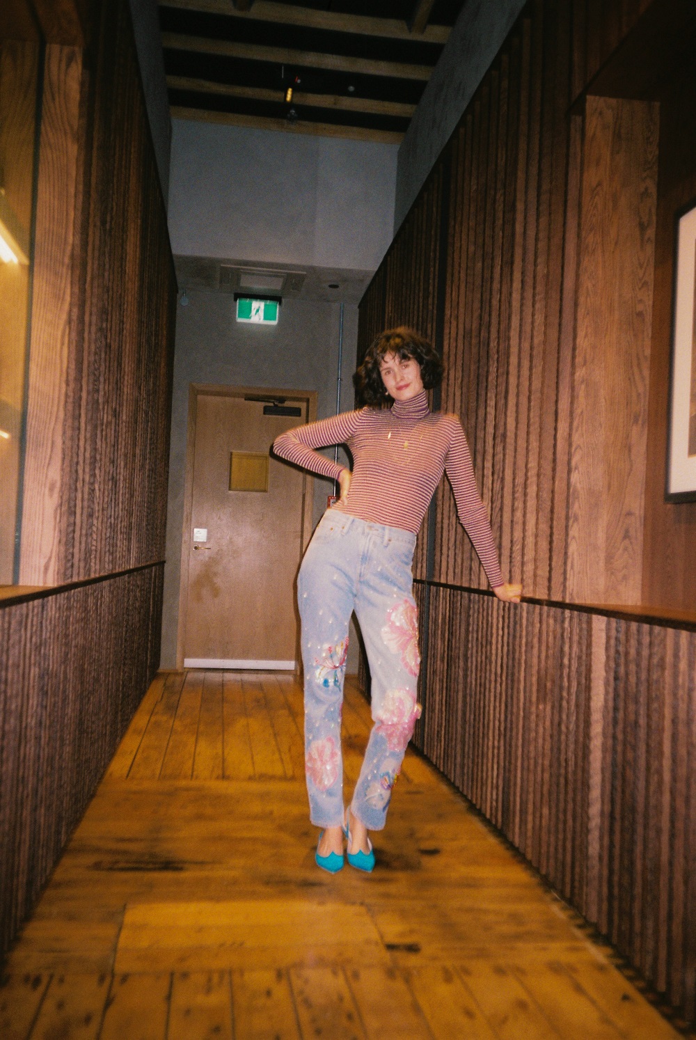 Chloe Hill wearing upcyled Levi's denim jeans. Photo / Supplied