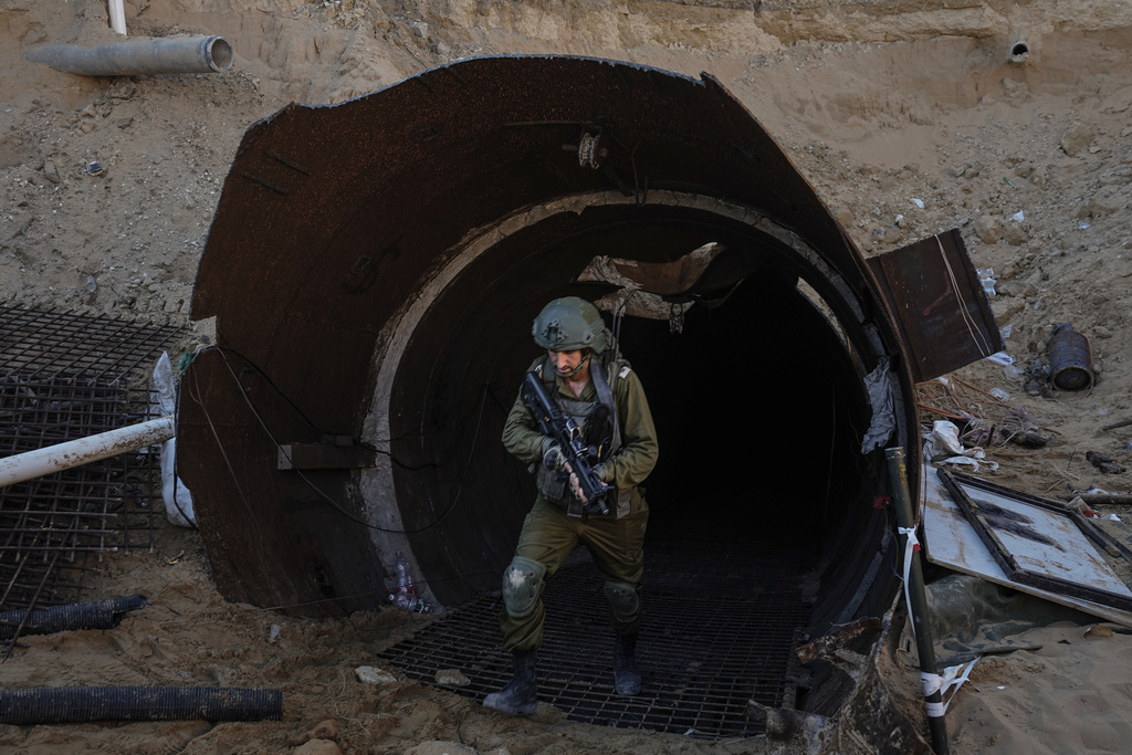 Israeli soldiers exit a tunnel that the military says Hamas militants used to attack the Erez crossing in the northern Gaza Strip. Photo / AP