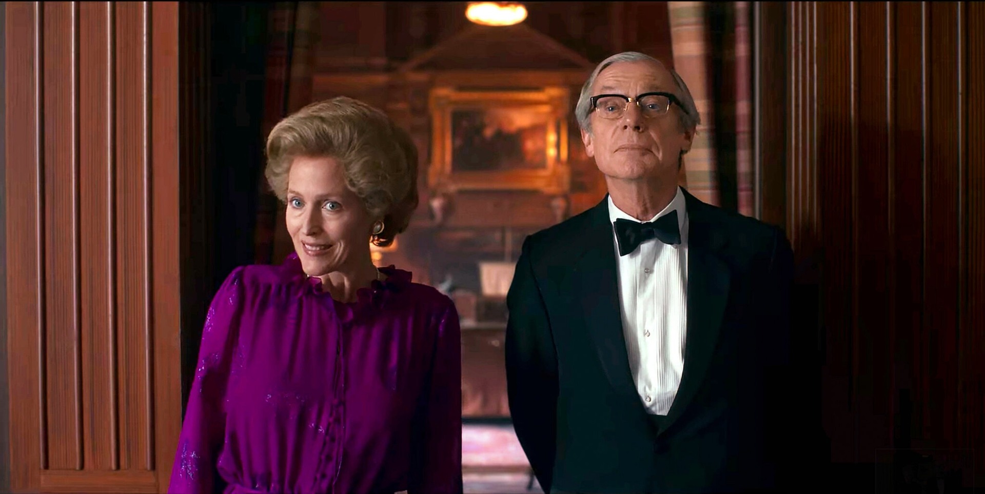 On The Crown, Margaret Thatcher (Gillian Anderson) and her husband, Denis (Stephen Boxer), dress to impress for dinner with the royal family. Photo / Netflix
