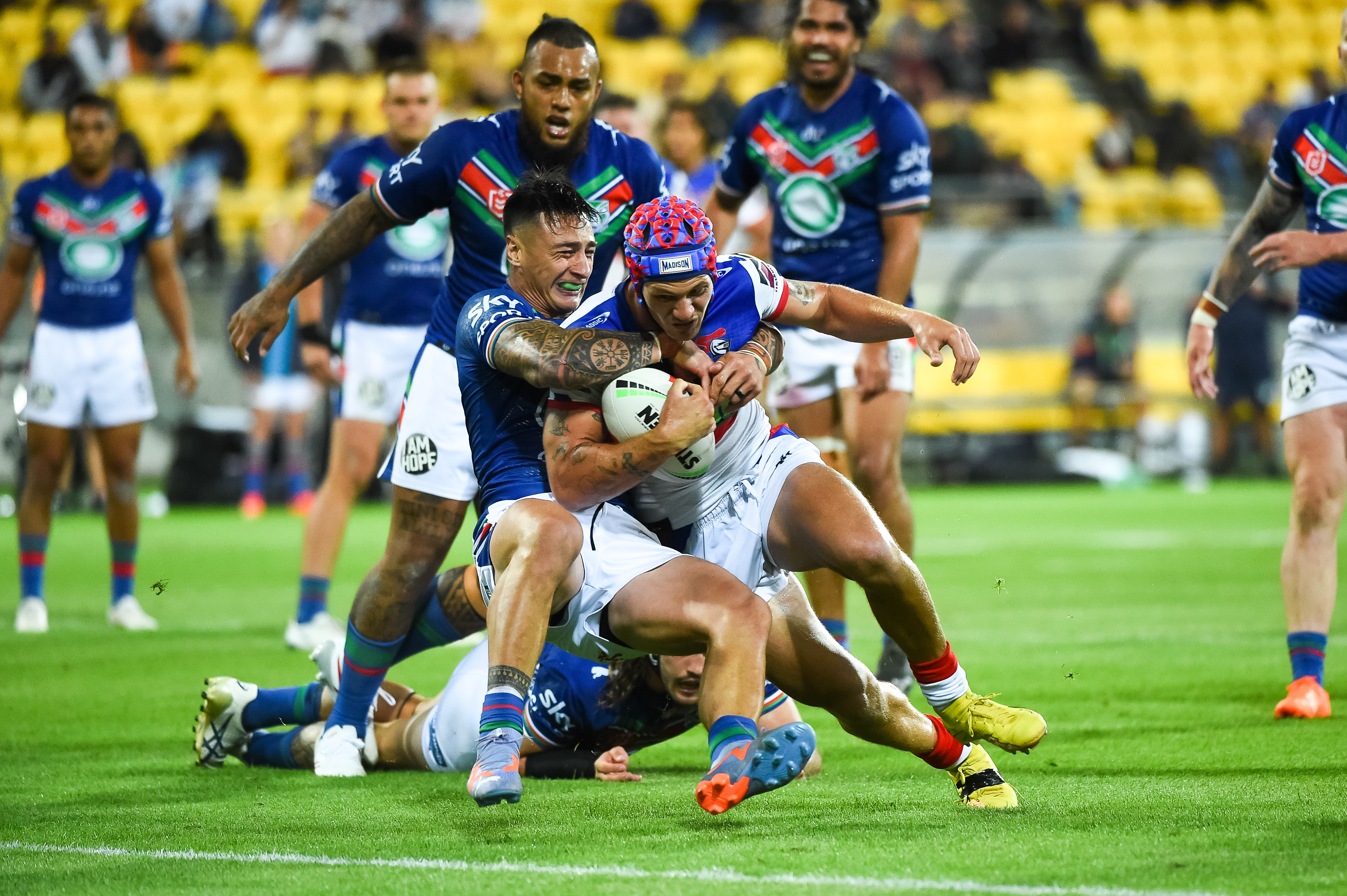 Charnze Nicoll-Klokstad prevents a Kalyn Ponga try. Photo / Photosport
