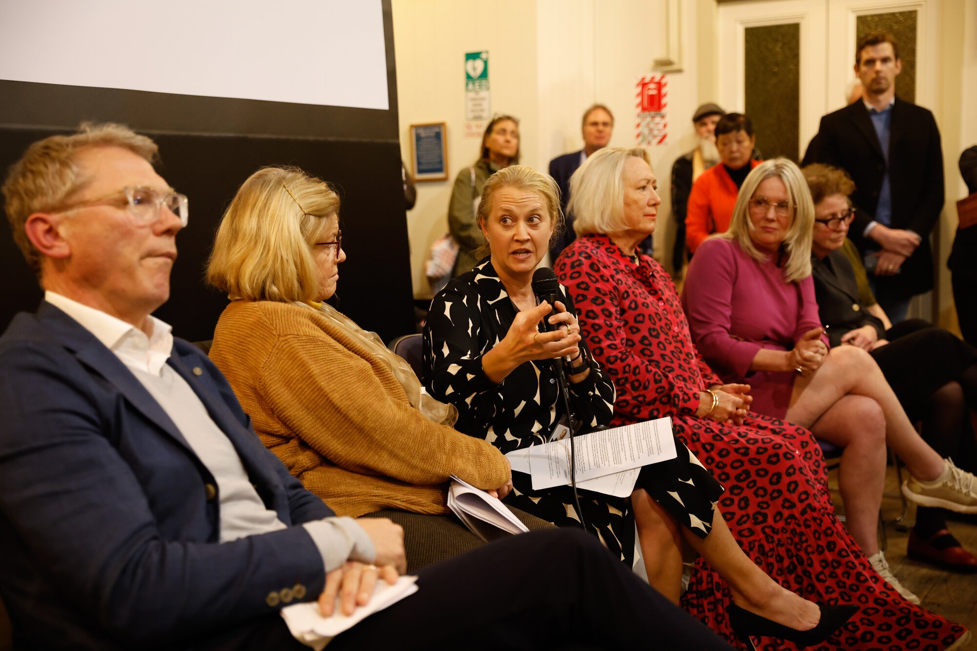 Speakers at the meeting included Cabinet minister Paul Goldsmith (left), council planner Celia Davidson, local board chairwoman Kendyl Smith, councillor Christine Fletcher, local MP Helen White and urban planning lecturer Elizabeth Aitken Rose. Photo / Sylvie Whinray
