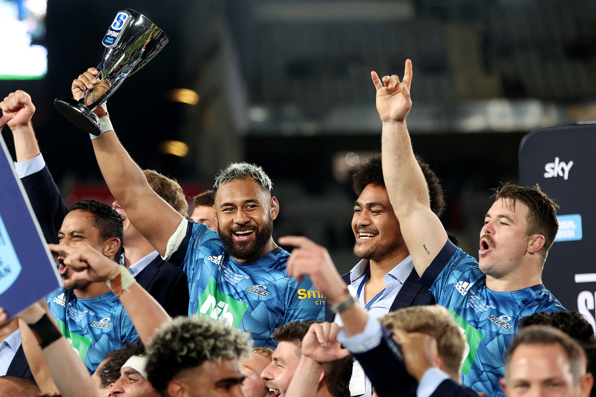 Patrick Tuipulotu of the Blues holds up the trophy following the Super Rugby Transtasman final. Photo / Getty