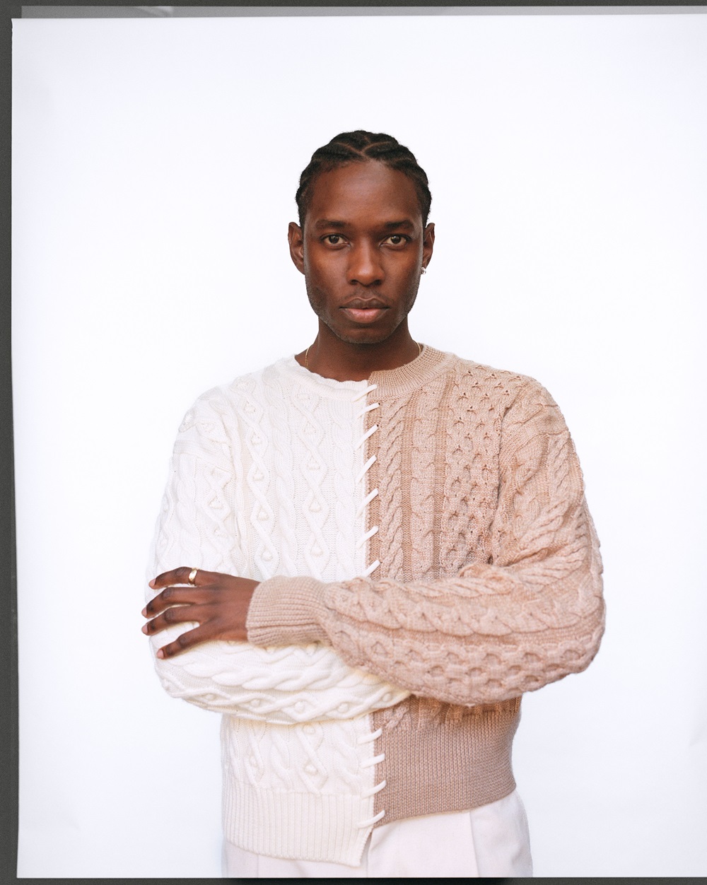 Mika Byarugaba wears Wynn Hamlyn jumper and Kowtow jeans. Photo / Rob Tennent