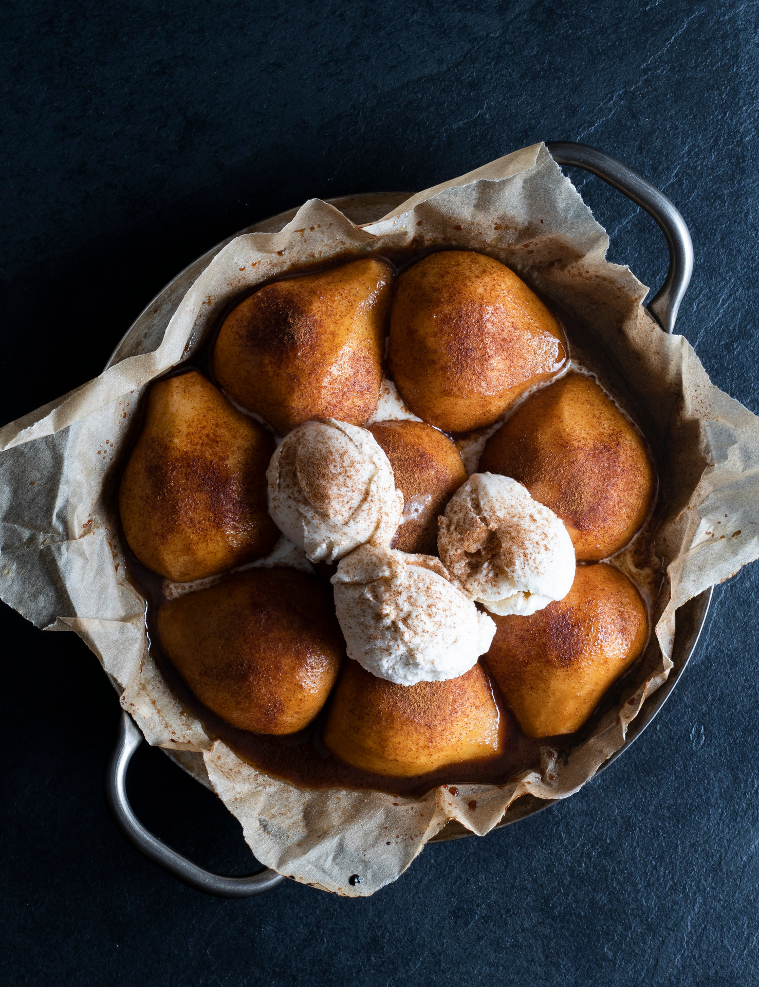 Pears baked with date syrup. Photo / Bite.co.nz