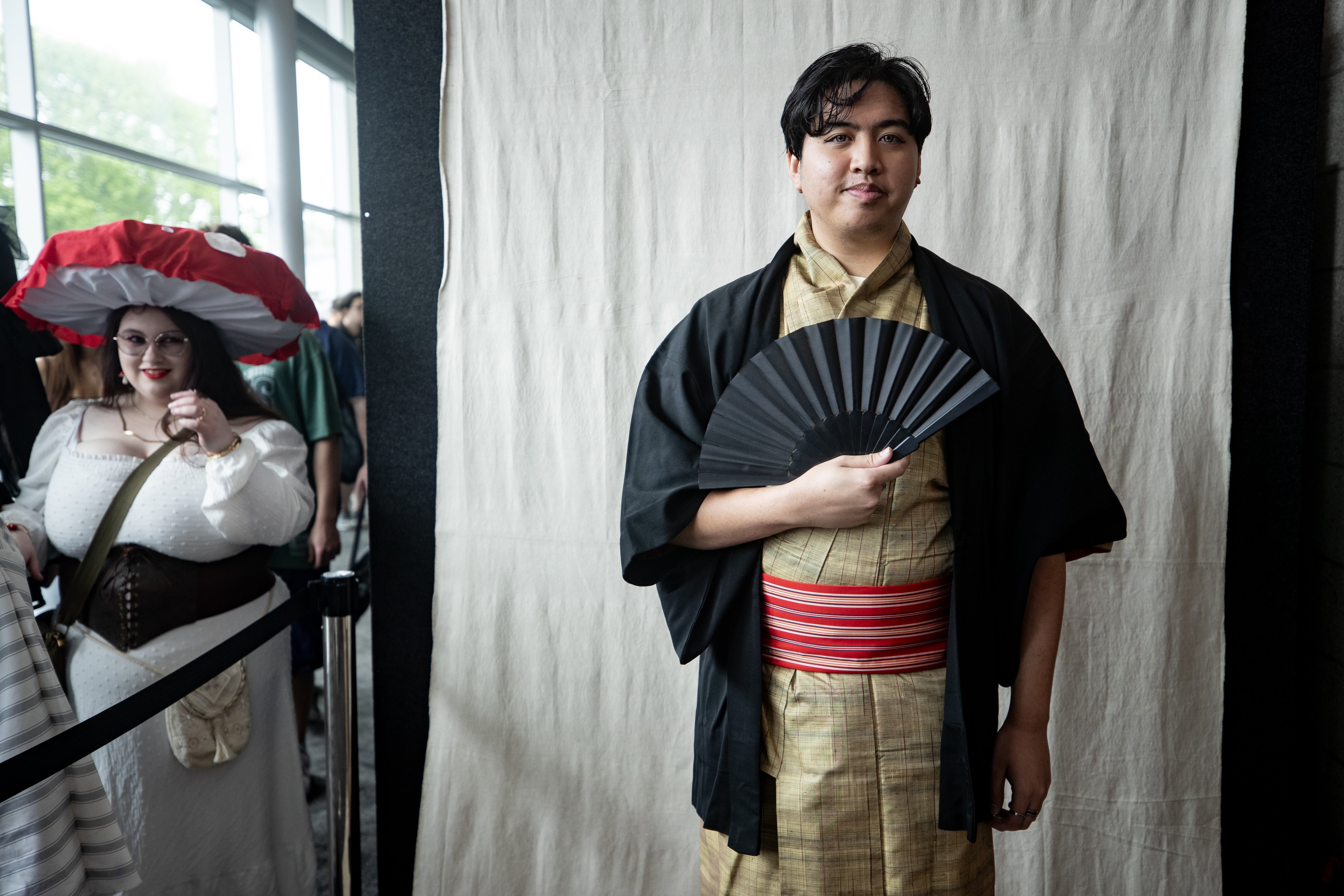 Marco Javate wears a kimono, a haori jacket and piercing eye contacts at Armageddon 2024. Photo / Dean Purcell