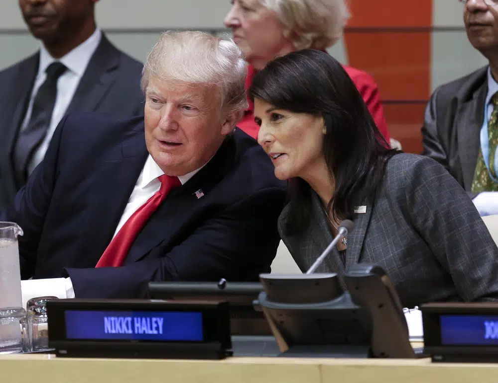 Donald Trump speaks with US Ambassador to the United Nations Nikki Haley before a meeting during the United Nations General Assembly in 2017. Photo / AP