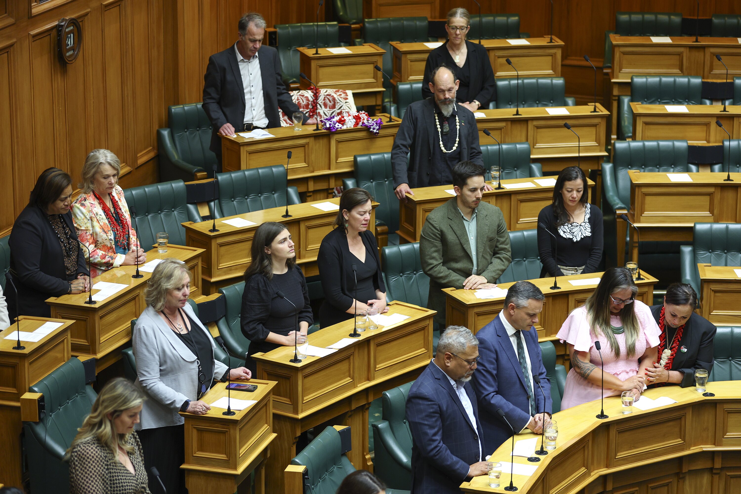 Green MPs observe a moment of silence during a tribute to Efeso Collins at Parliament on Wednesday. Photo / Hagen Hopkins.