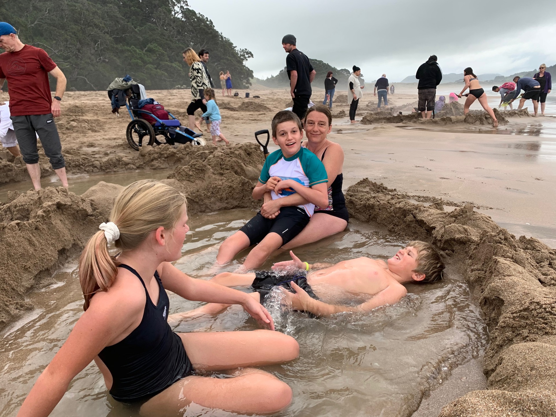 Enjoying Hot Water Beach, Coromandel. Photo / Kimberly Graham
