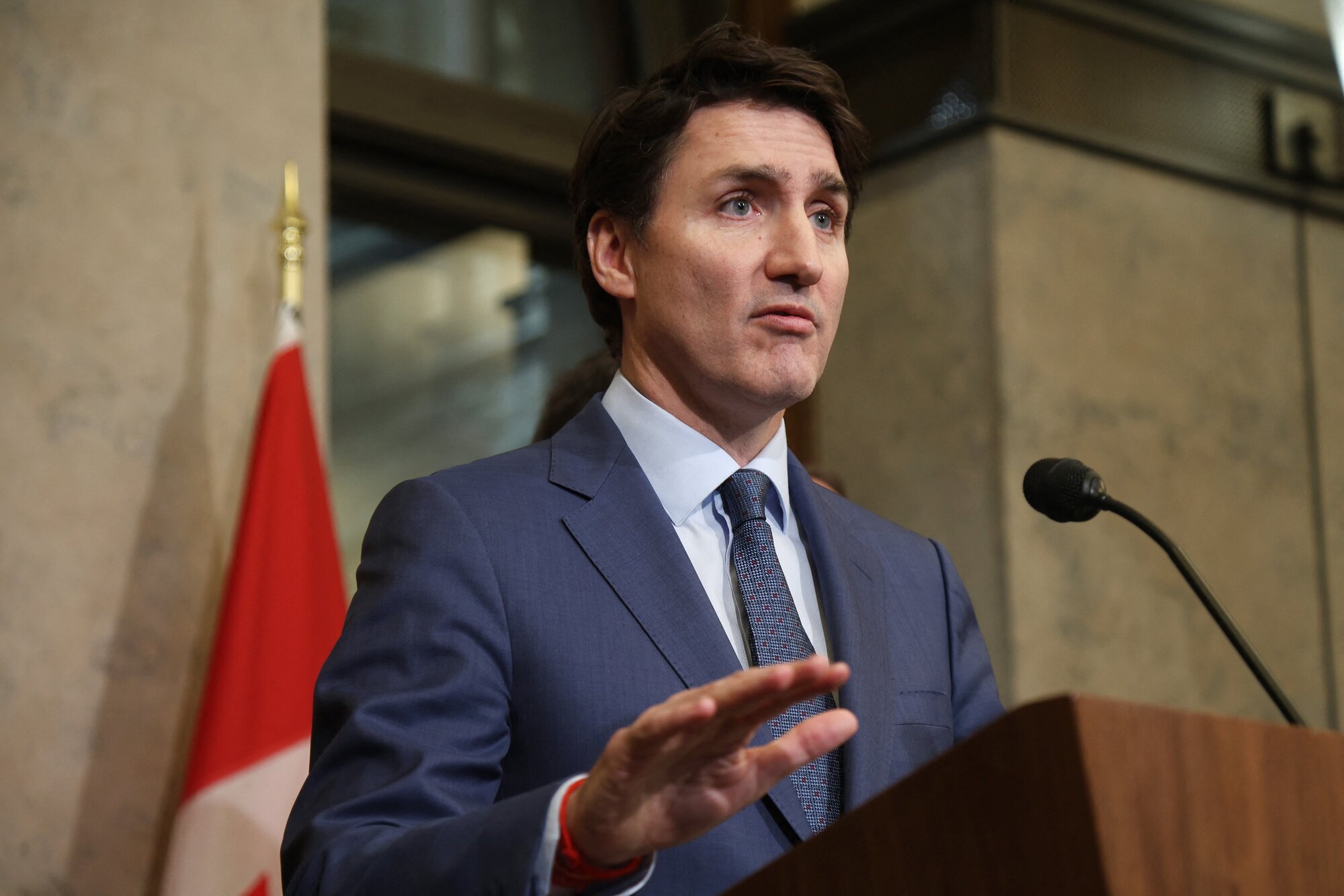 Canada's departing Prime Minister Justin Trudeau became emotional while speaking against US tariffs at a press conference. Photo / AFP