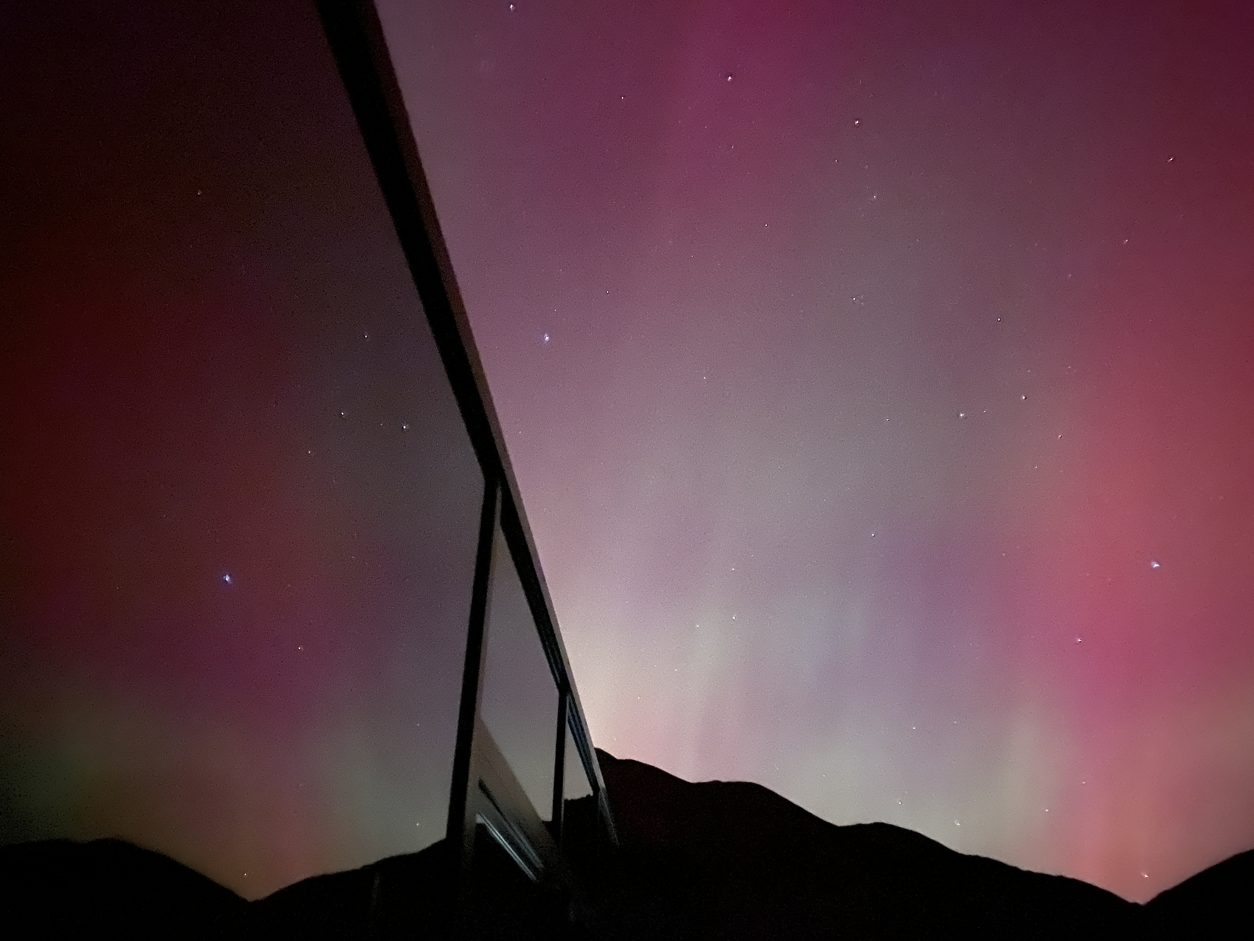Aurora Australis, aka the Southern Lights, reflected on one of The Lindis luxury lodge's three mirrored pods. Photo / Stephanie Holmes