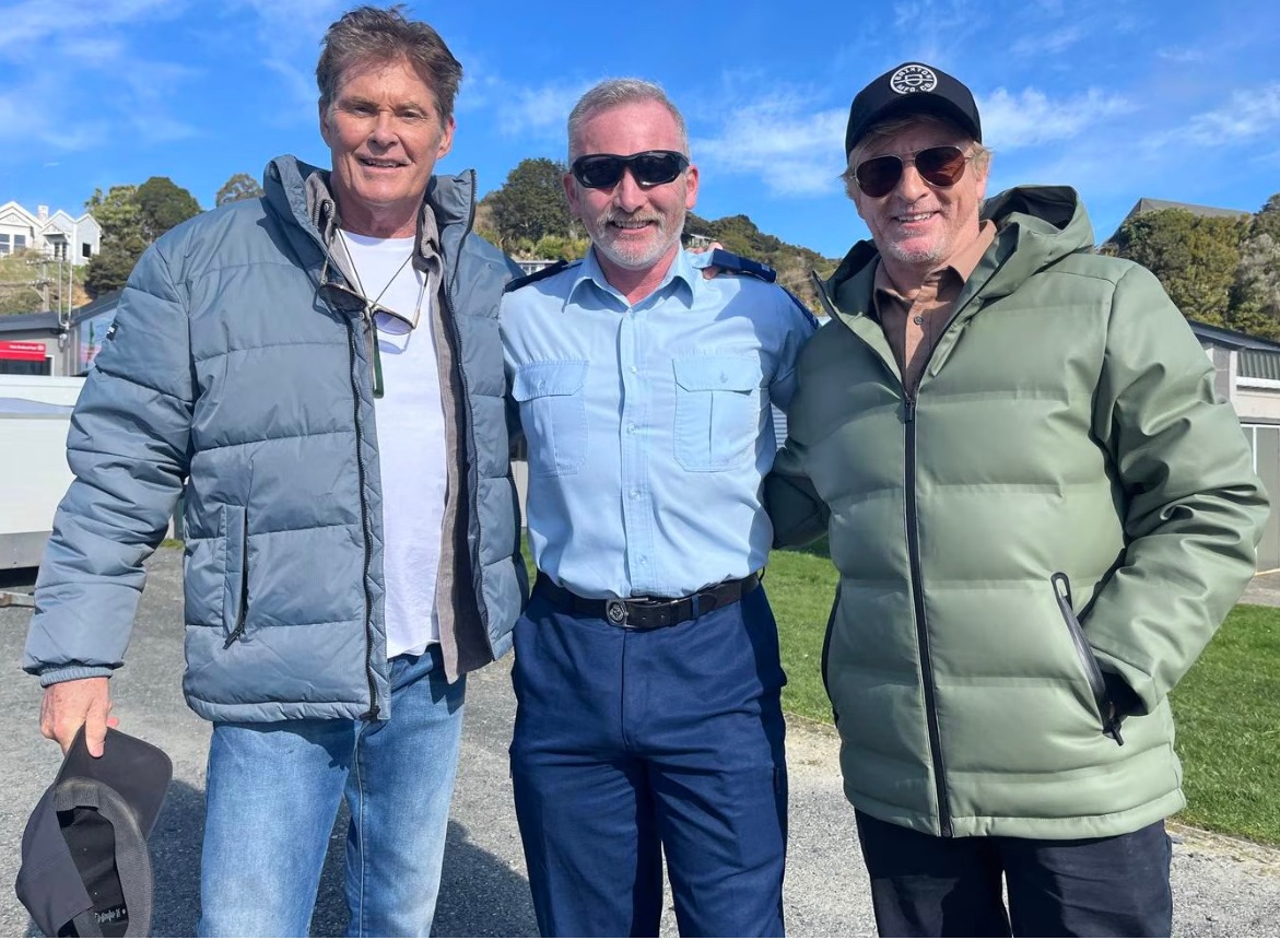 David Hasselhoff, left, with comedian Rhy Darby, right, and Stewart Island police officer Stuart Newton during filming of the travel and comedy series in 2023.