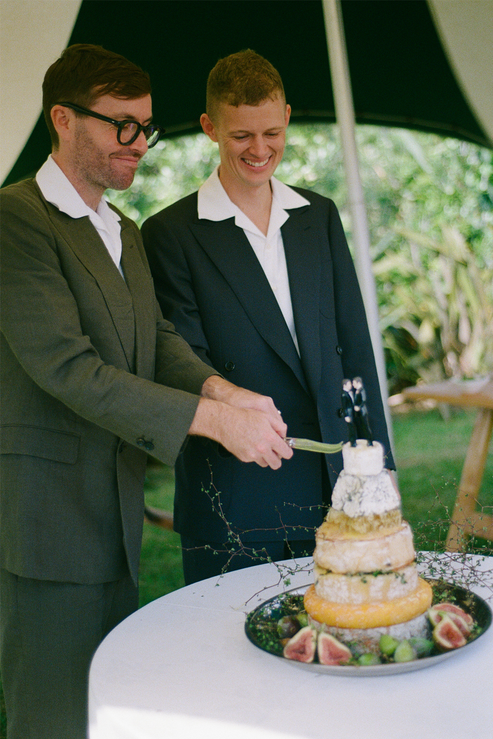 Will Coleman and Cam Deynzer opted for a cheese tower instead of a traditional wedding cake. Photo / Poet Pictures