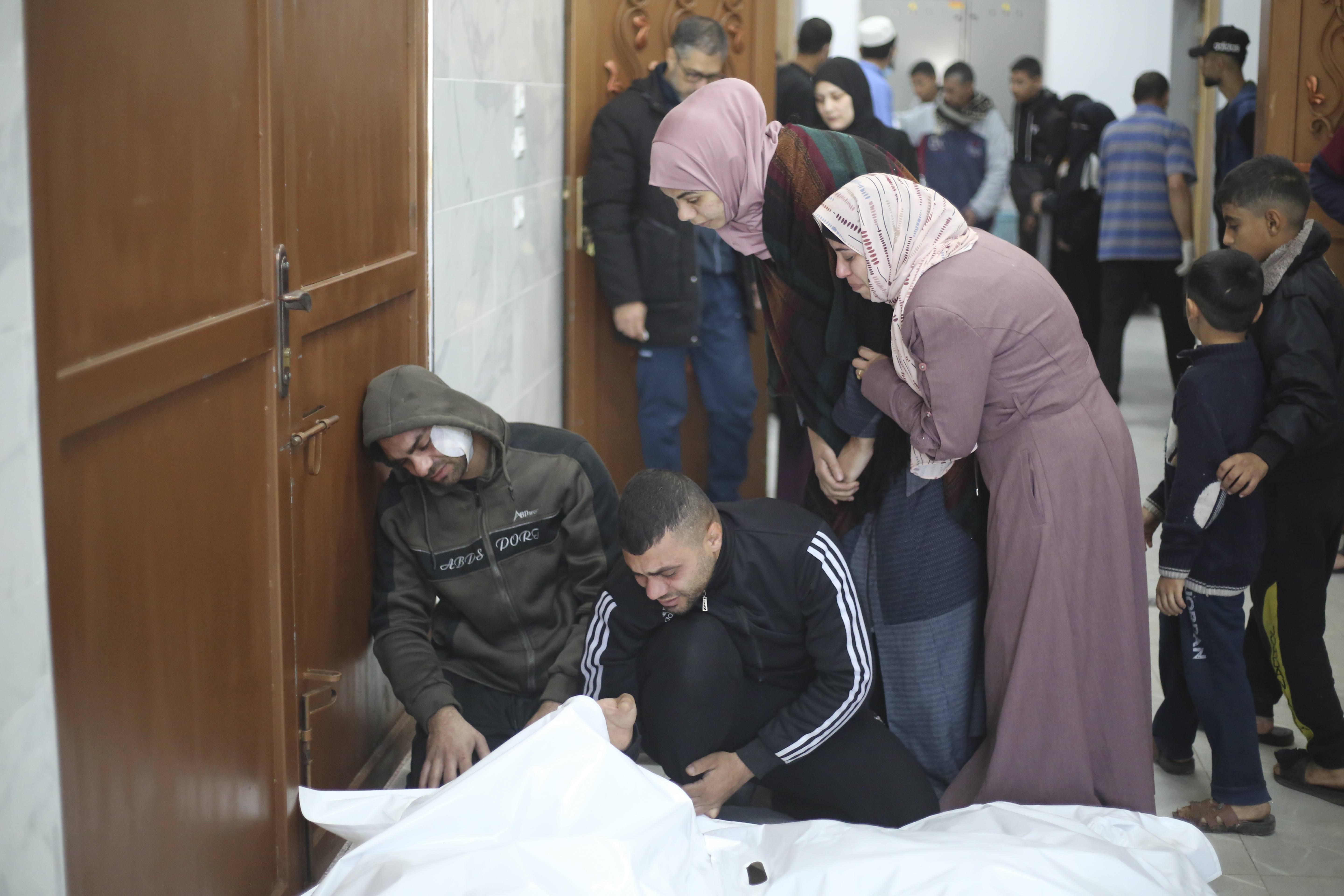 Palestinians mourn relatives killed in the Israeli bombardment of the Gaza Strip in Khan Younis. Photo / AP