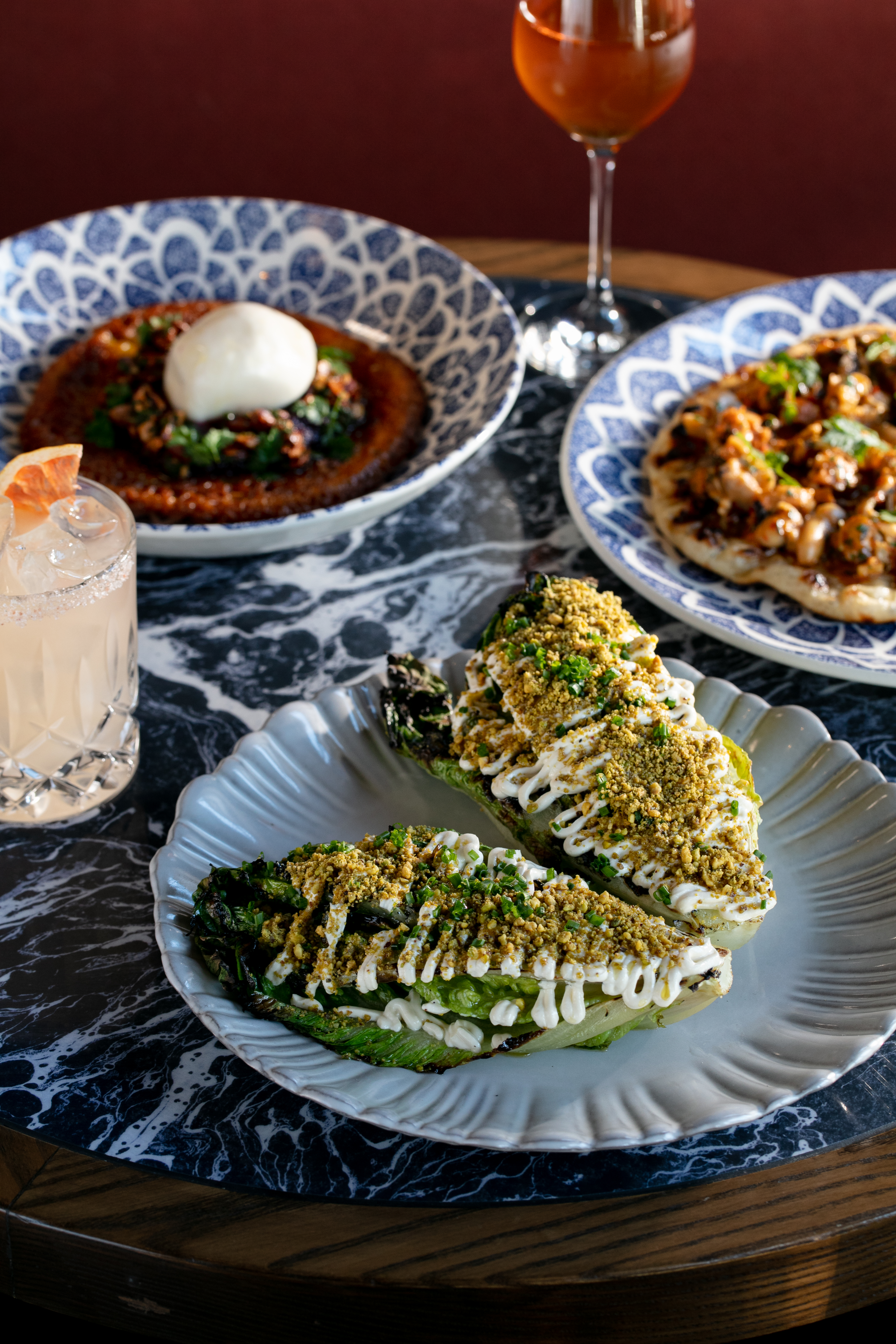 The cos lettuce, chickpea pancake and mussel flatbread on the menu at Daphnes restaurant in Ponsonby. Photo / Babiche Martens
