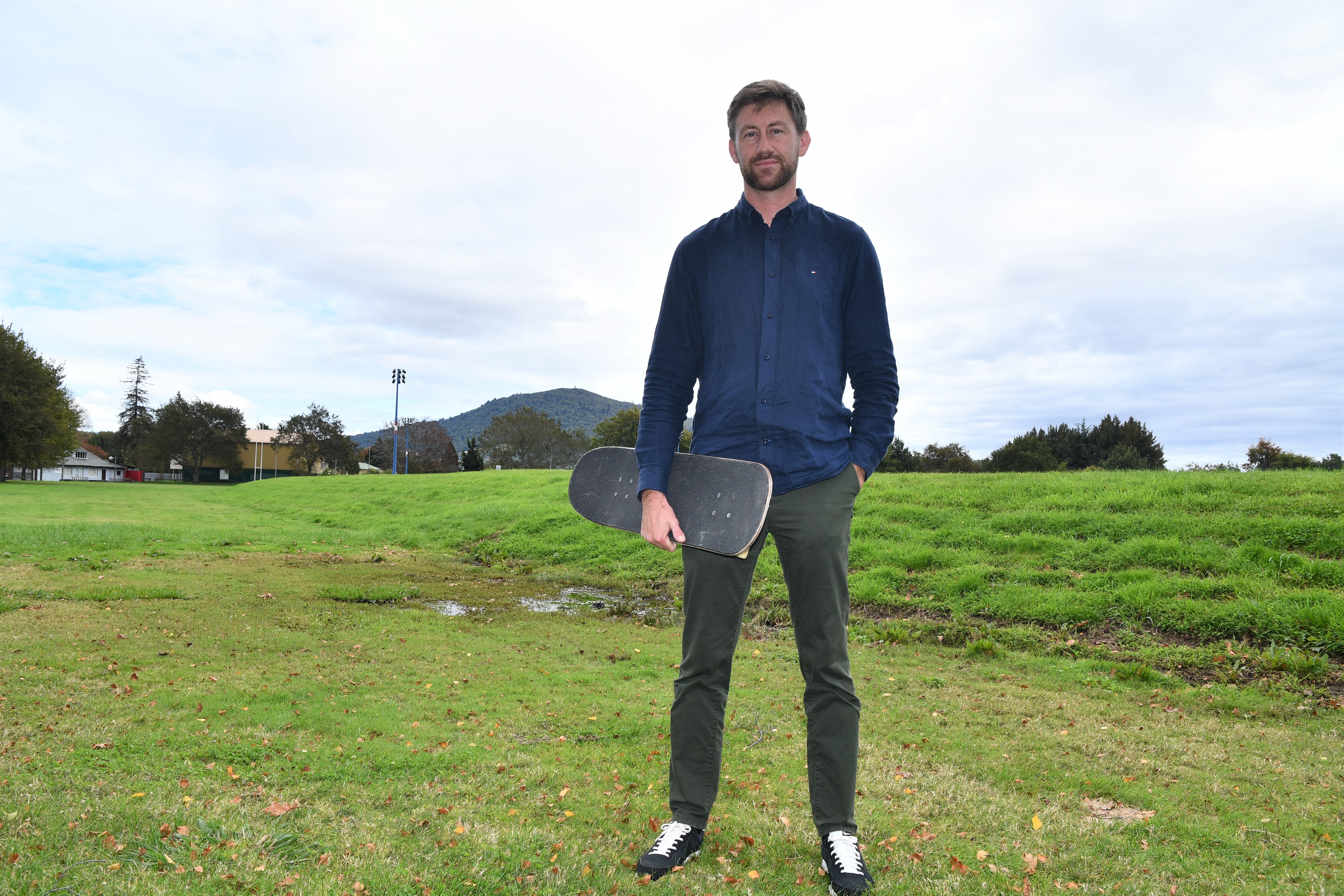 Skate park advocate Ryan Gray standing where the Kuirau Park skate park would be built. Photo / Laura Smith