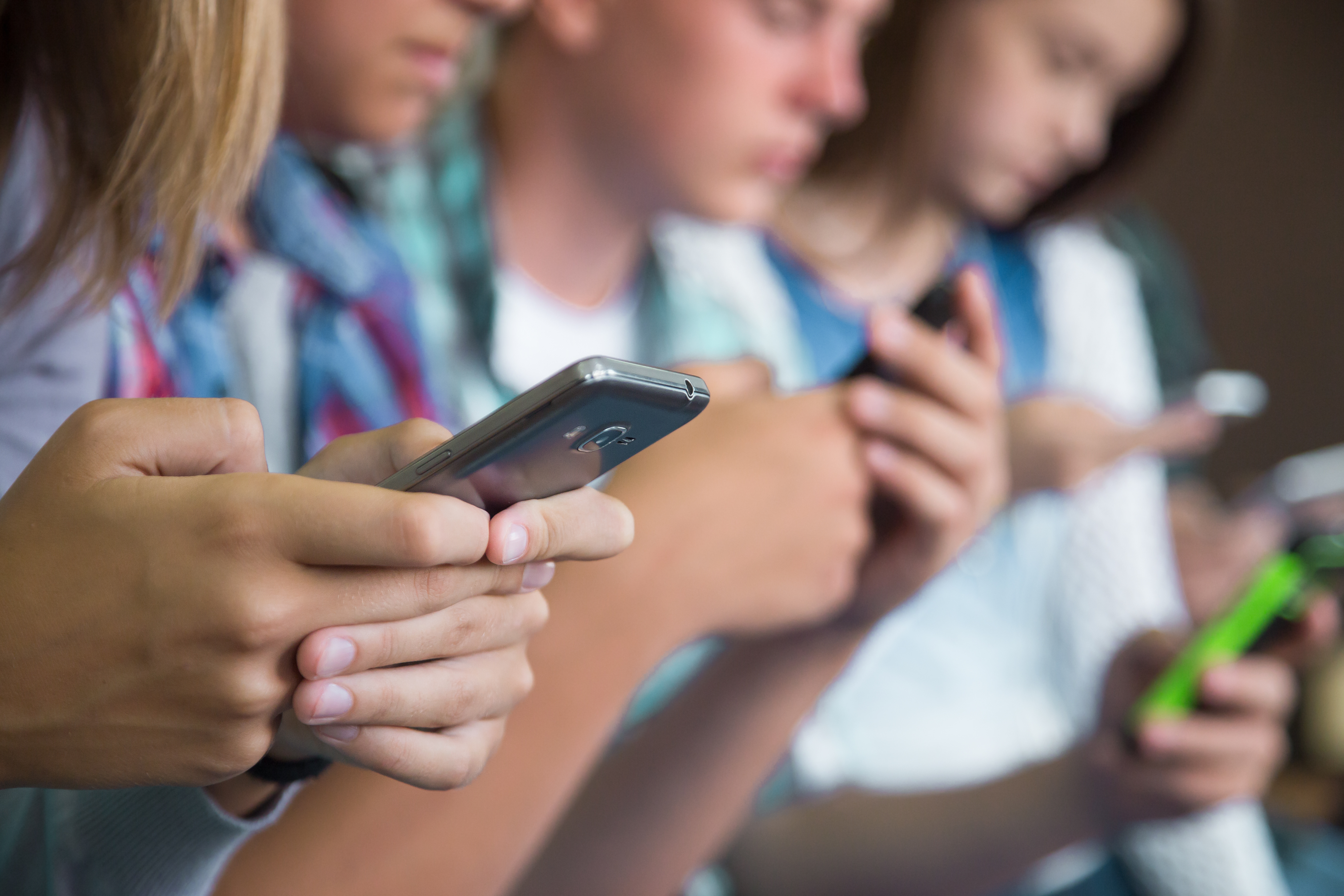 Schools are battling daily fallout from teen social media use, from bullying to exhaustion. Photo / 123RF