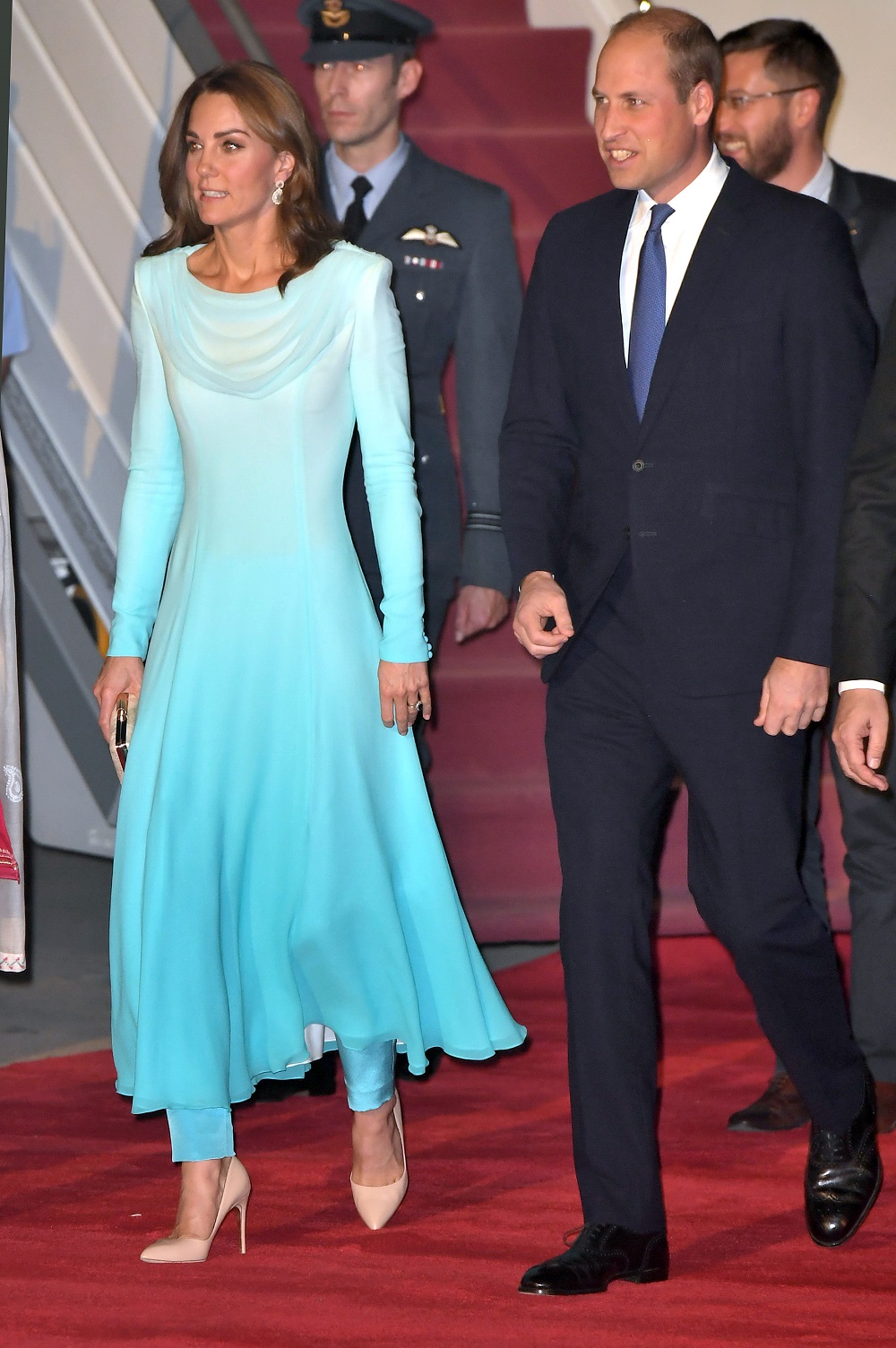 Duchess Of Cambridge wears a turquoise Catherine Walker tunic and trousers in Rawalpindi, Pakistan. Photo / Getty Images