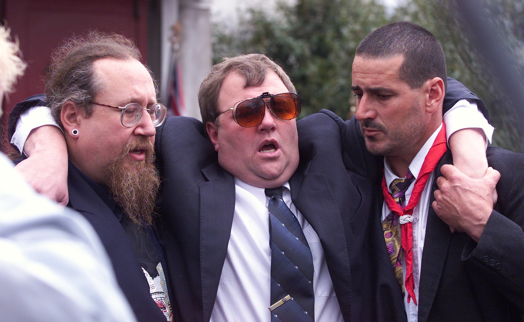 Mark Lundy is supported as he leaves the church after the funeral service for his wife Christine and daughter Amber in Palmerston North, onSeptember 7, 2000. Photo / Mark Mitchell