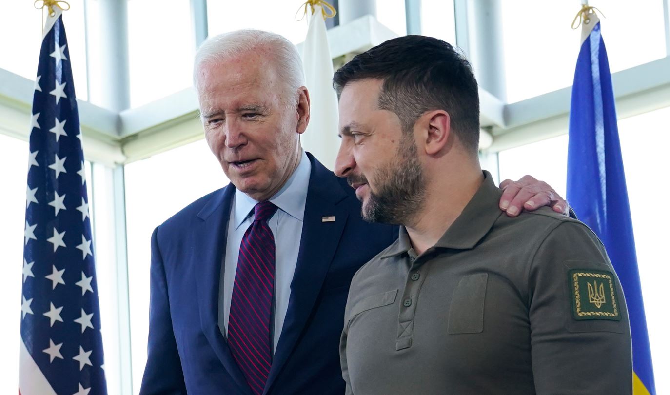 US President Joe Biden (left) walks with Ukrainian President Volodymyr Zelenskyy. Photo / AP