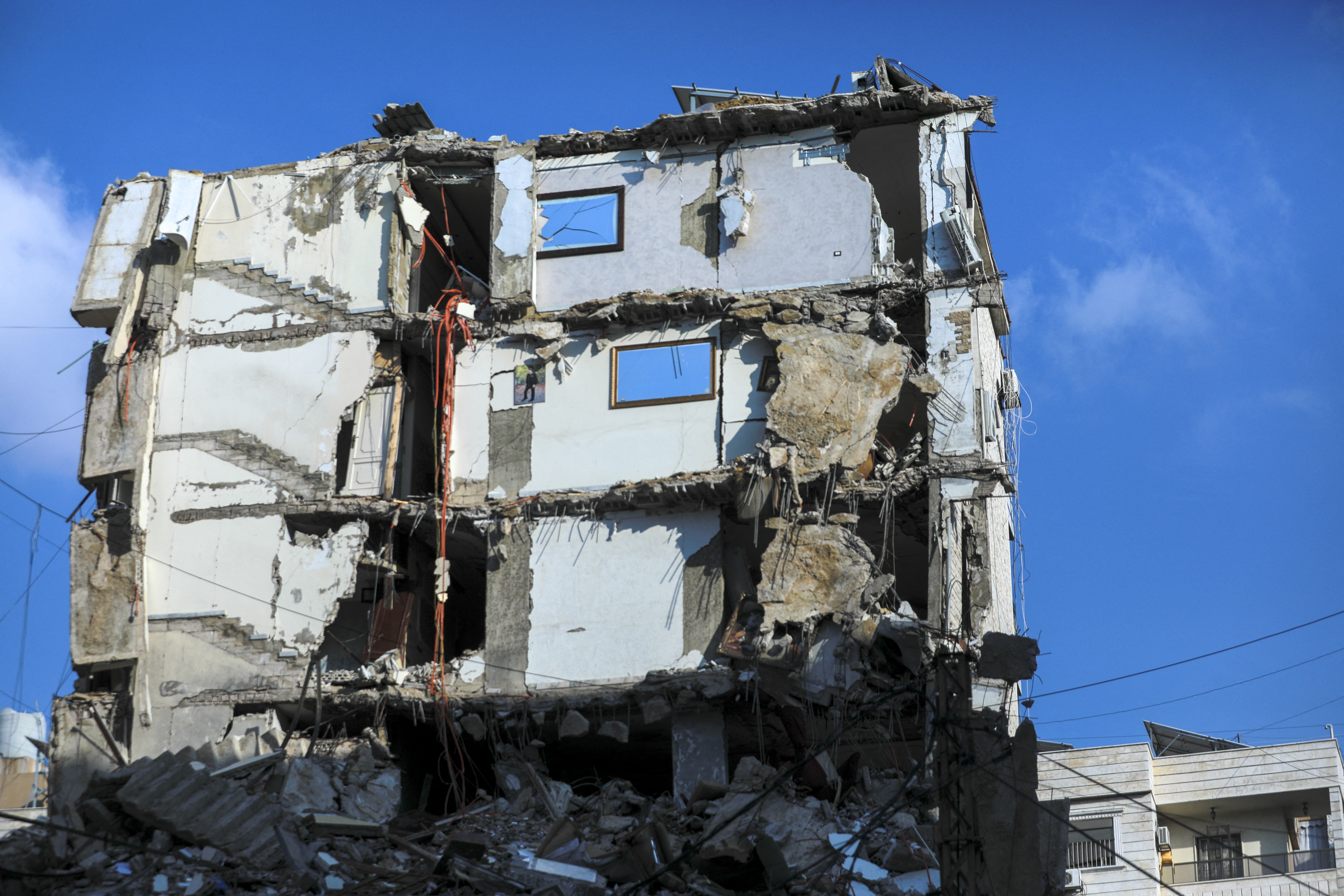 This picture taken during a media tour organised by Hezbollah press office on November 5, 2024, shows a destroyed building on the site of an Israeli airstrike that targeted earlier last week Beirut's southern suburbs al-Jamous neighbourhood. Photo / AFP