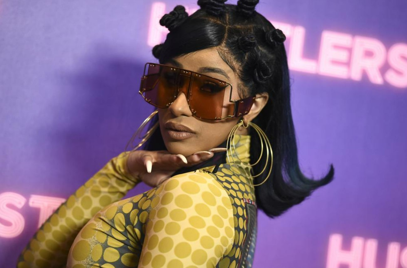 Cardi B Explains the Meaning of Face Tattoo Unveils New One on Instagram  Live  Teen Vogue