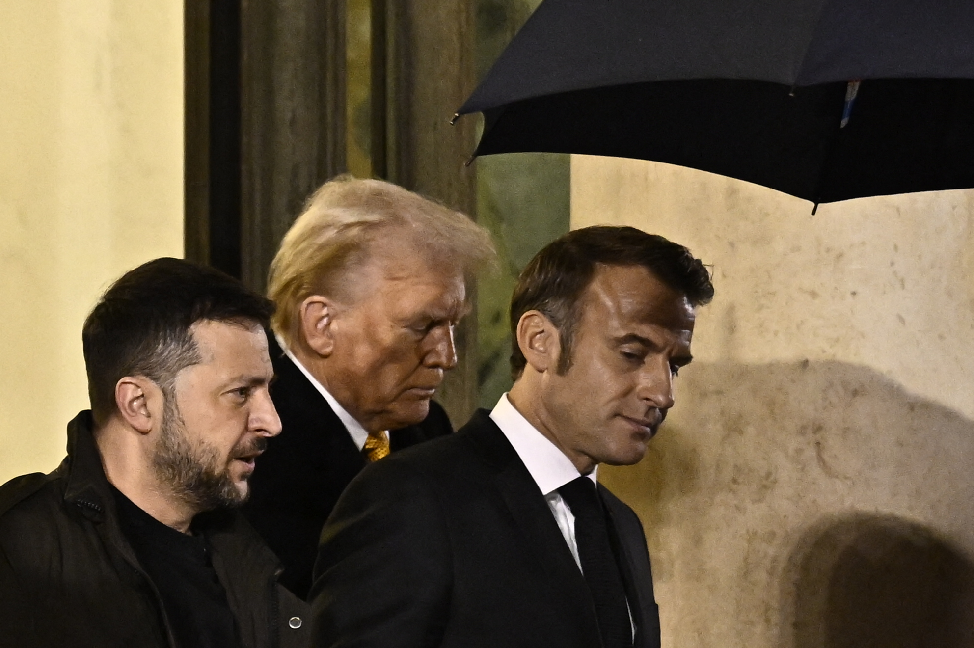France's President Emmanuel Macron (right), US President-elect Donald Trump and Ukraine's President Volodymyr Zelensky (left), met at the Elysee Presidential Palace in Paris on December 7, 2024. Photo / AFP