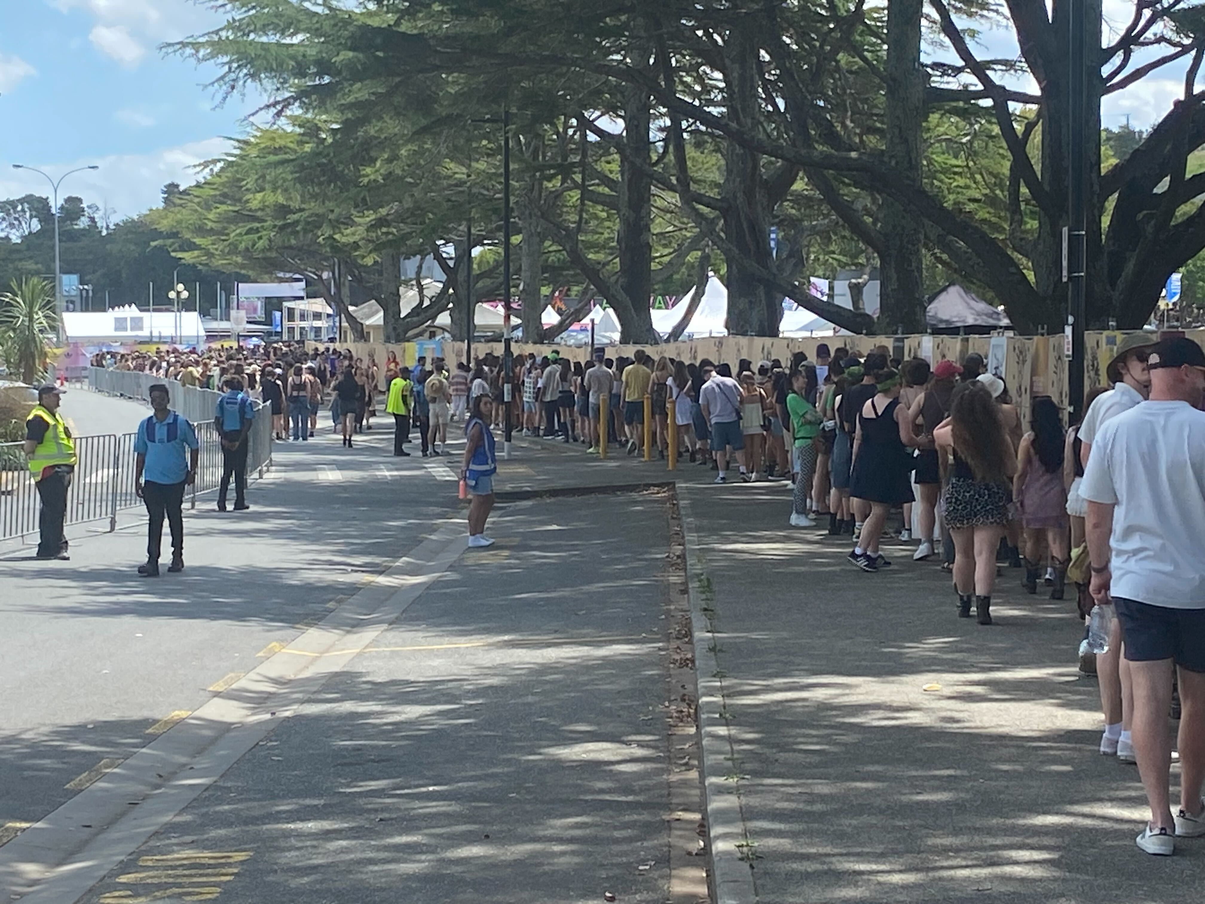 Concertgoers queuing to to get into today's Laneway Festival at Western Springs, Auckland.