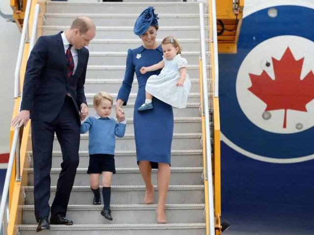 The Duke and Duchess of Cambridge, along with their children Prince George and Princess Charlotte step off the plane as they arrive in Victoria, British Columbia. Photo / News Corp Australia